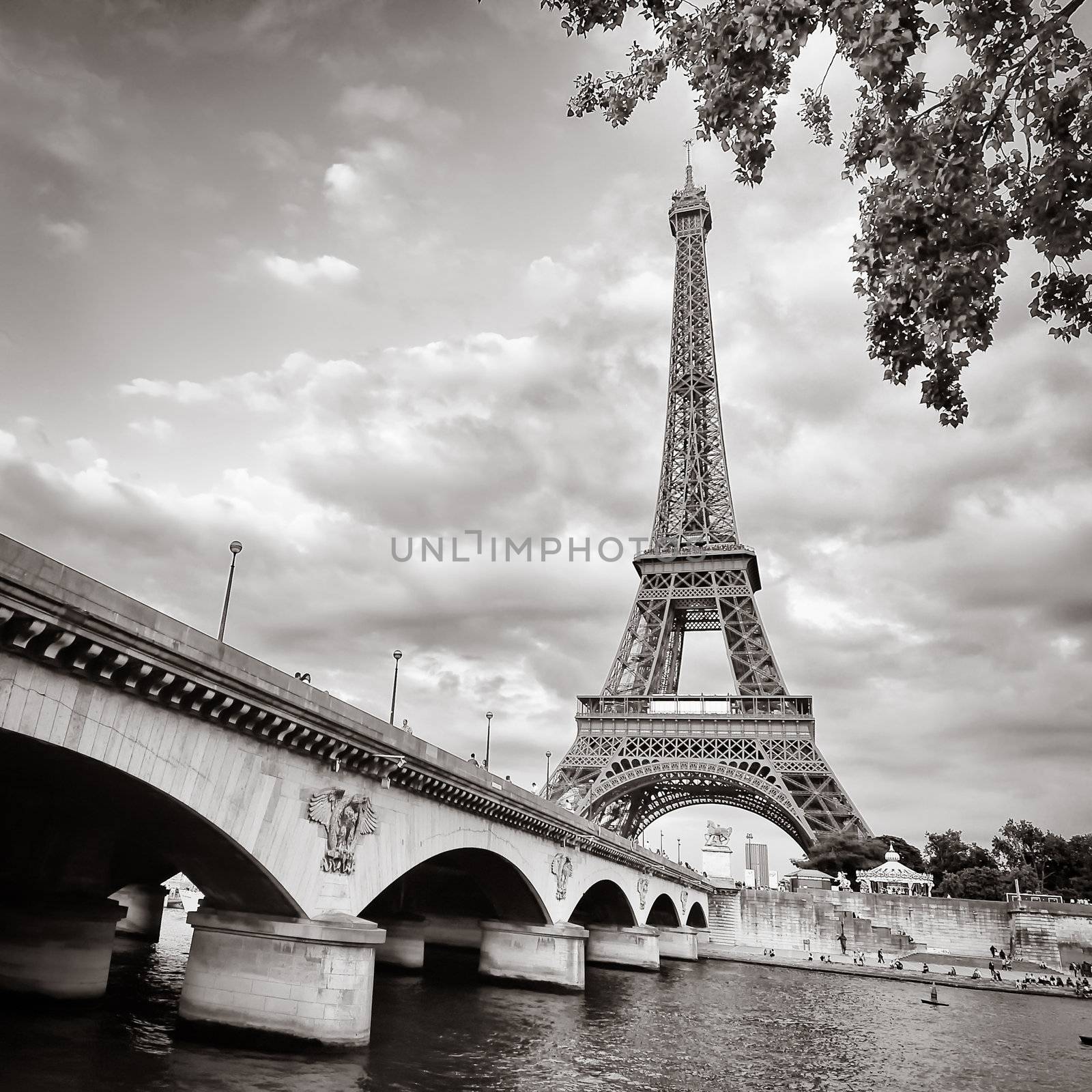 Eiffel tower monochrome view with river and bridge, Paris, France