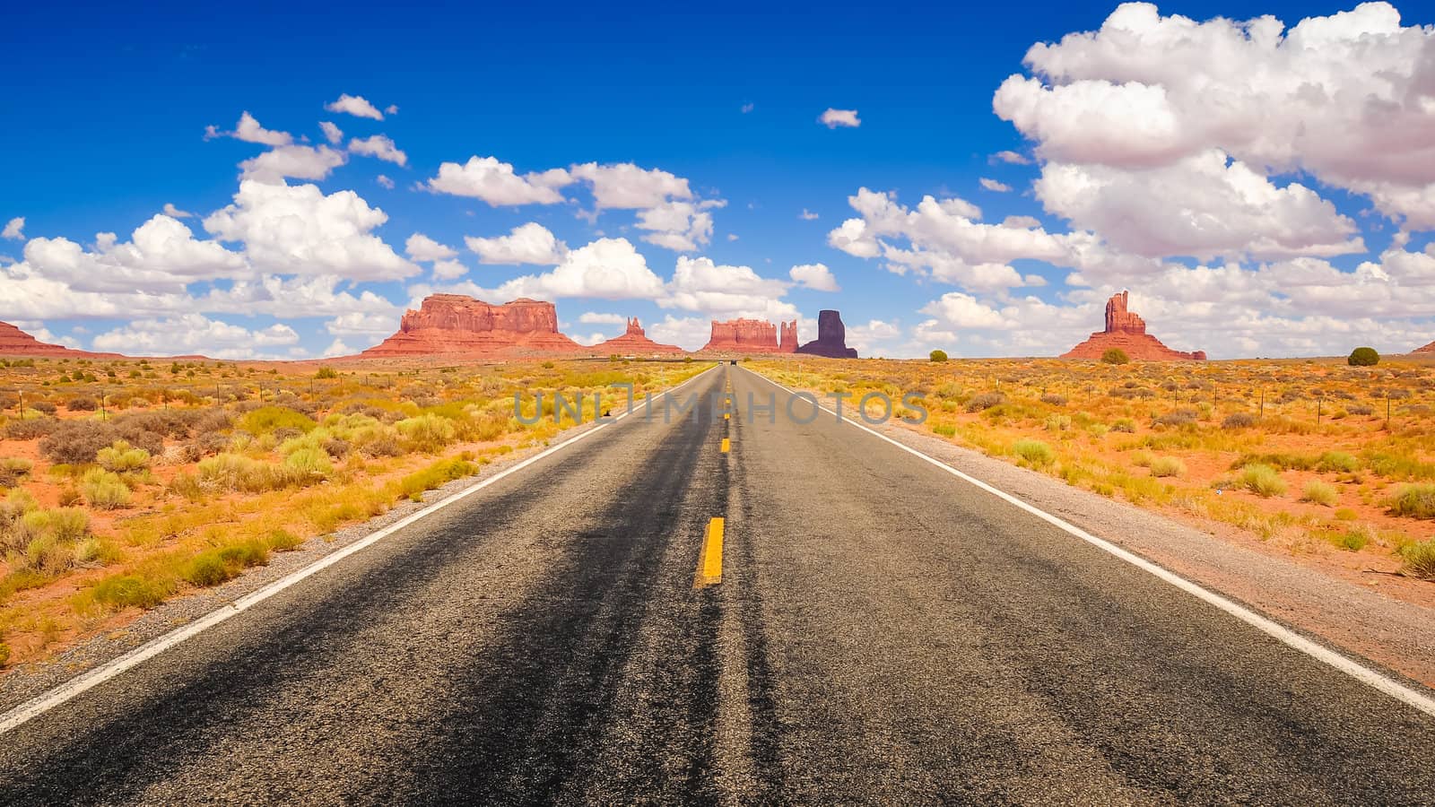 Long road in Monument valley national park, USA