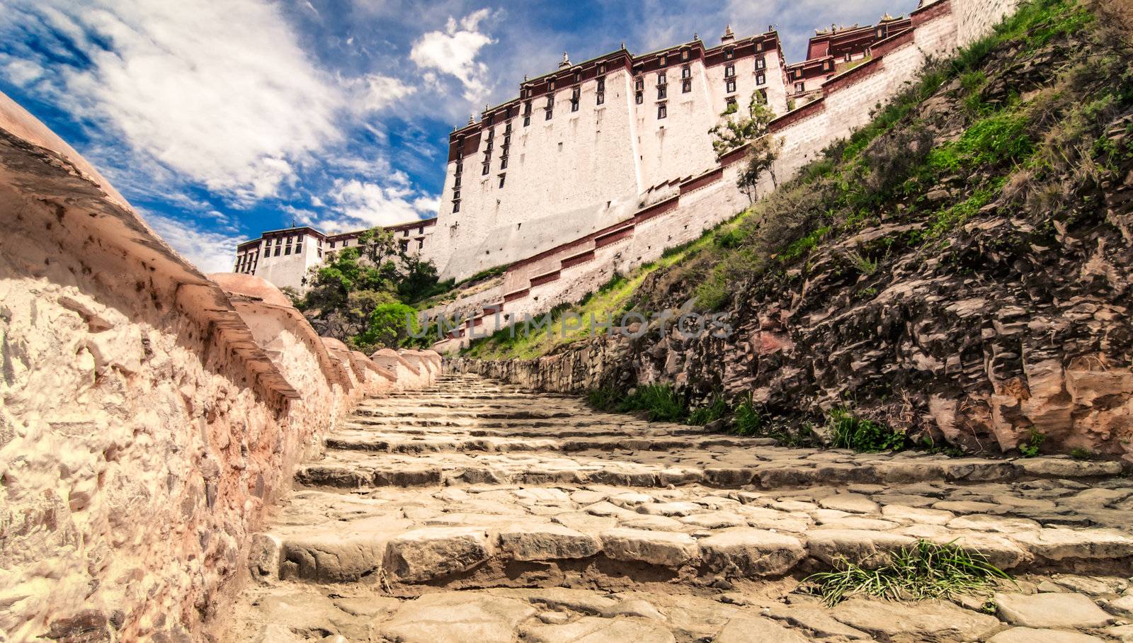 Potala temple view with blue sky and white clouds and stairs, Lhasa, Tibet