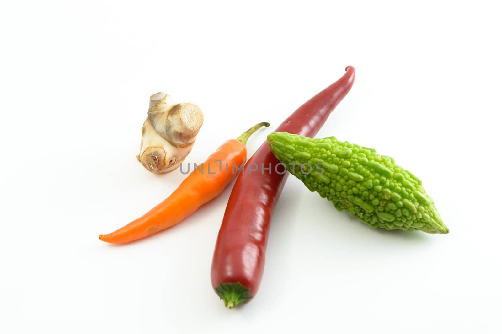 Fresh vegetables on a white background.
