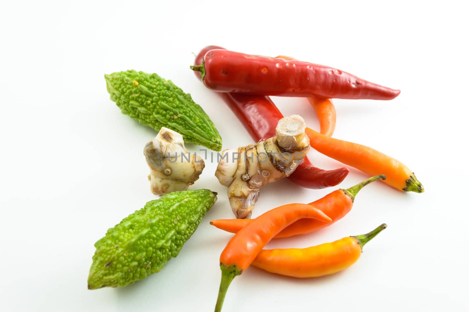 Fresh vegetables on a white background.