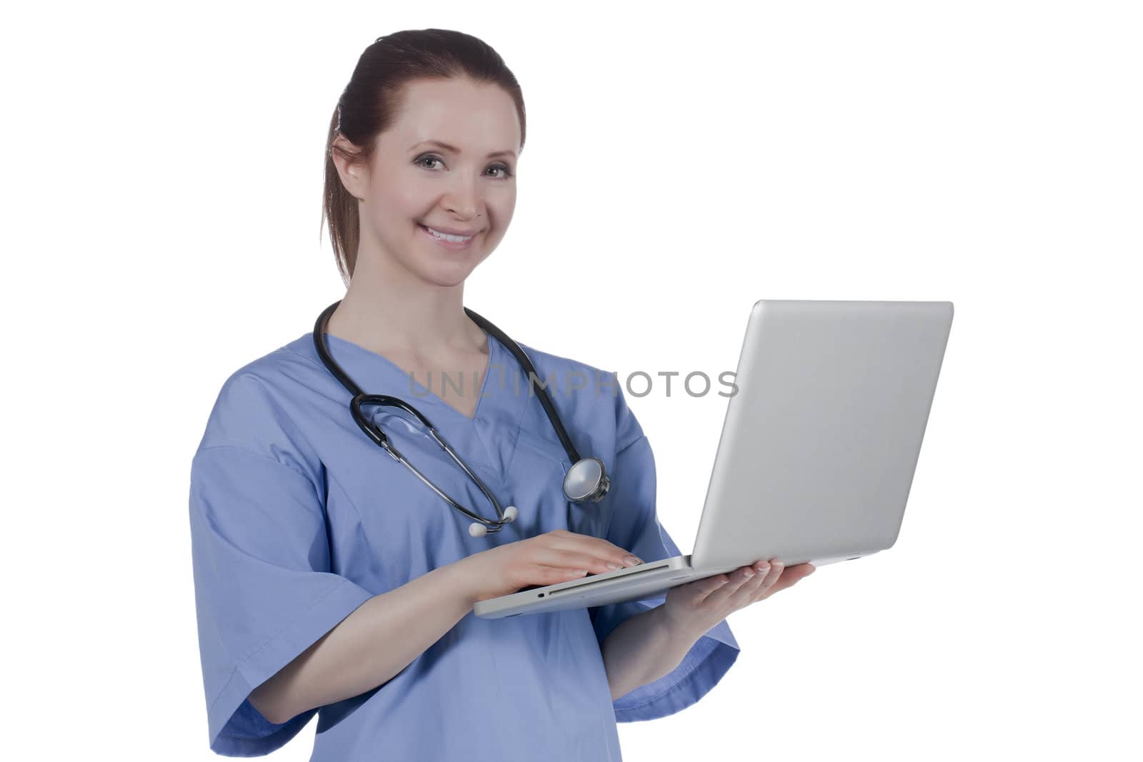 Smiling physician holding a laptop