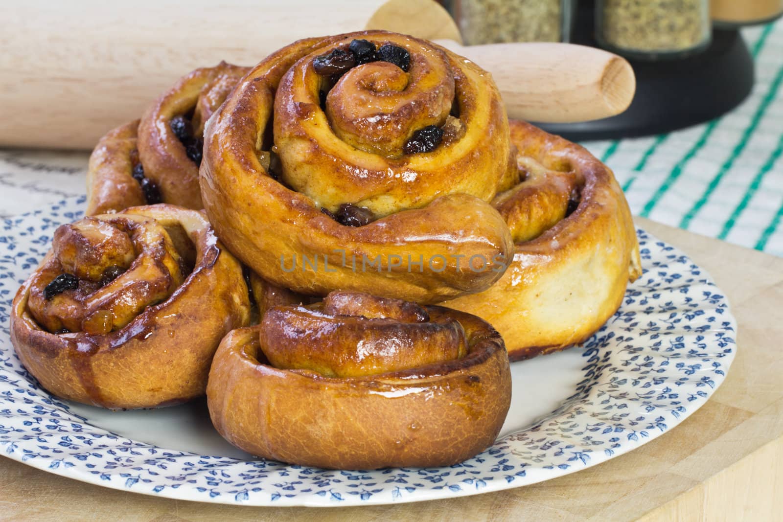 A plate of freshly baked Chelsea Buns