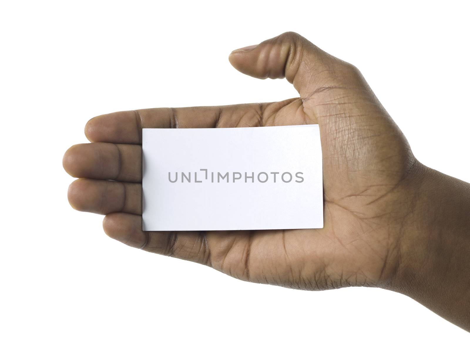 Close-up image of human hand holding card isolated on a white surface