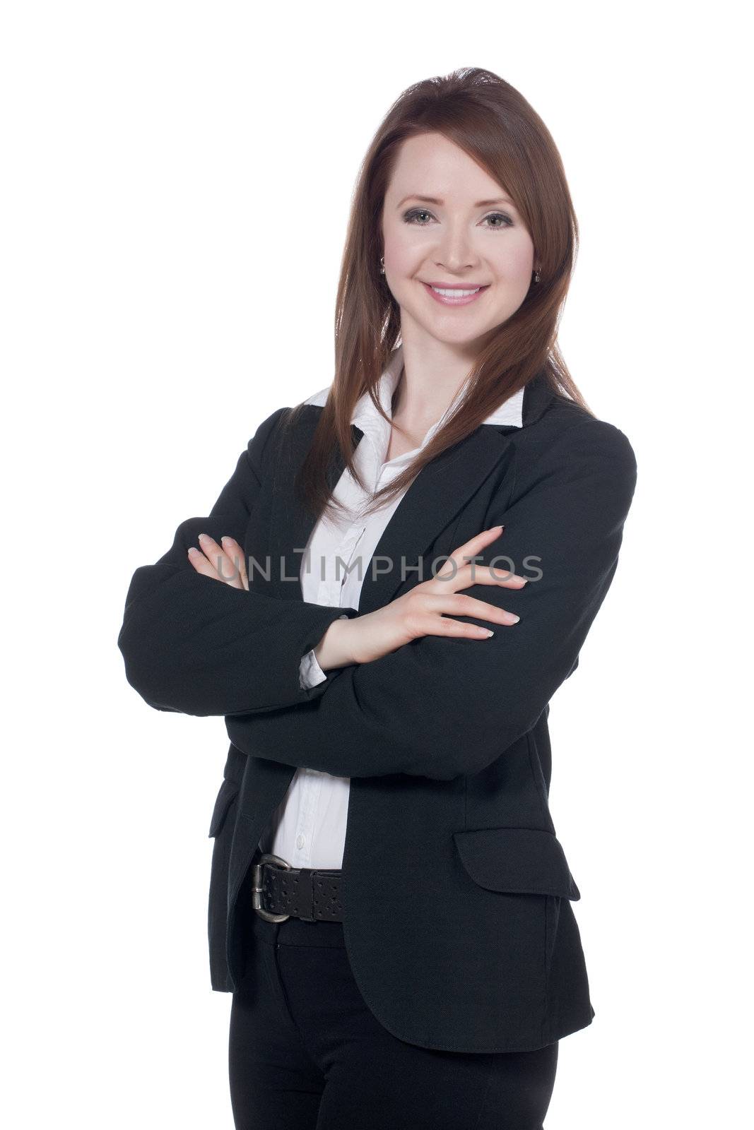 Close-up image of a happy businesswoman with arm crossed against the white surface