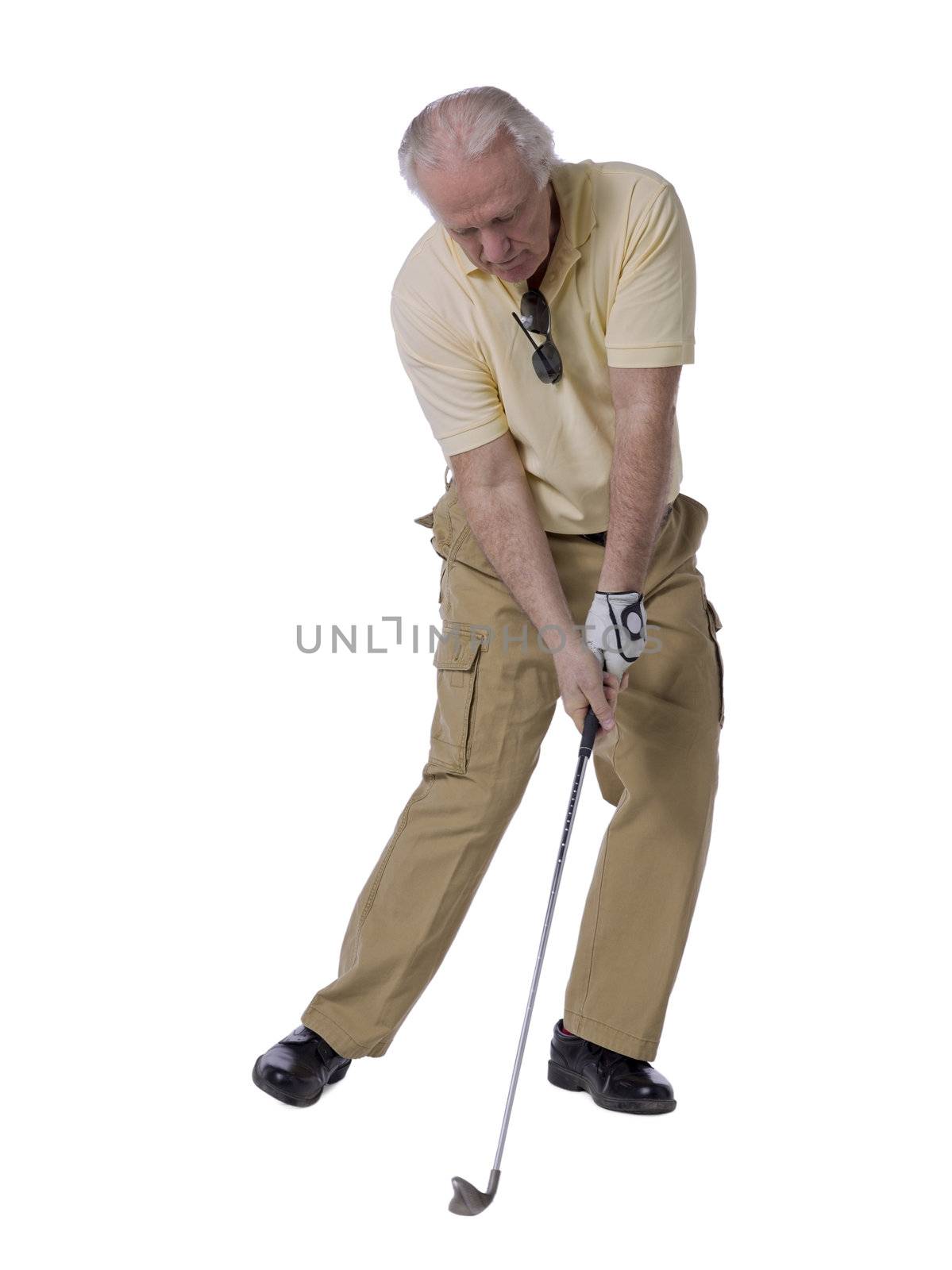 Mature Man Golfing Stock Photo