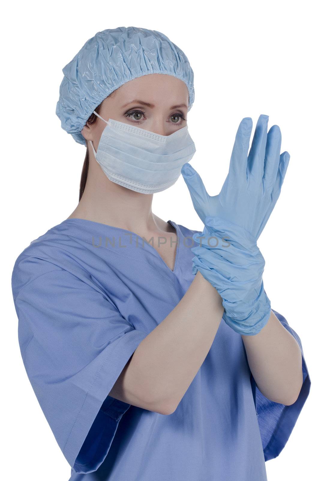 Close-up image of a female doctor wearing medical mask and gloves