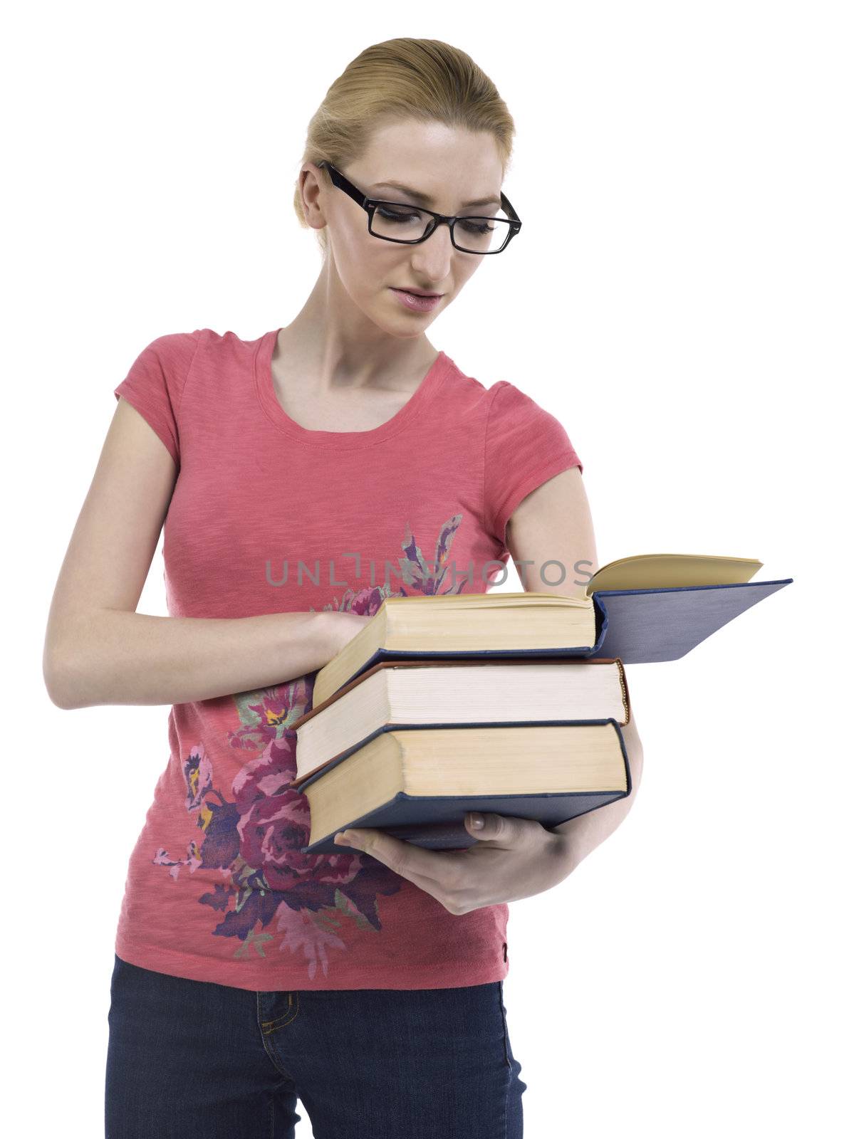 Close-up image of a female student reading book against the white surface