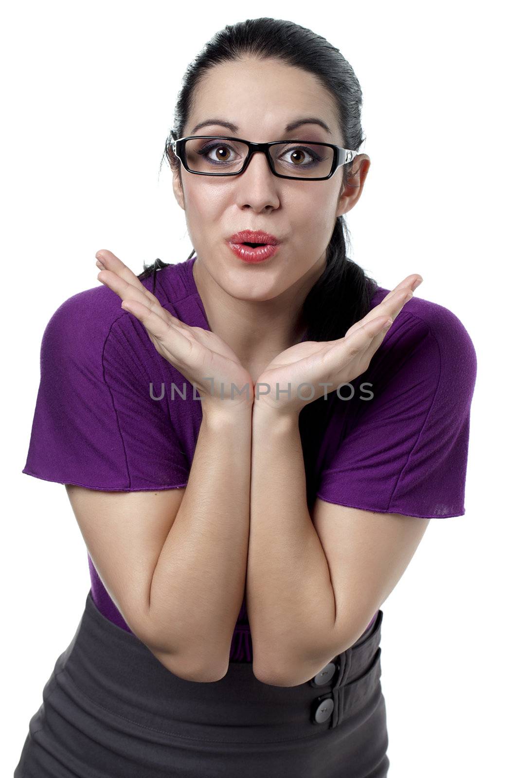 Close-up image of a beautiful woman blowing kisses over the white surface