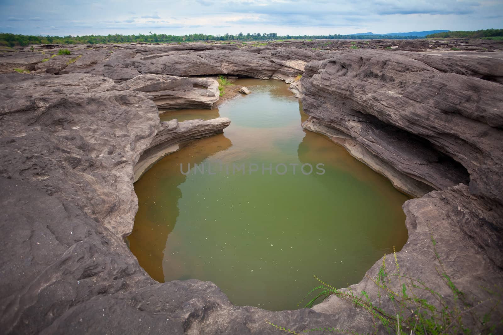 Sampanbok (3000 Hole), The Amazing of Rock in Mekong River, Ubon Ratchathani, Thailand.