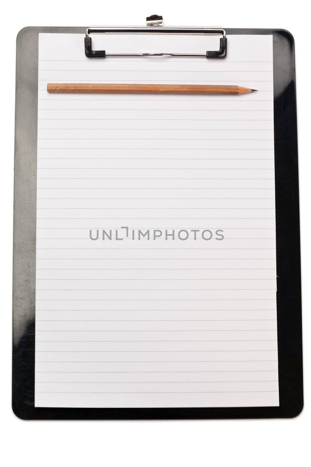 Pencil on the top of note pad on a white background