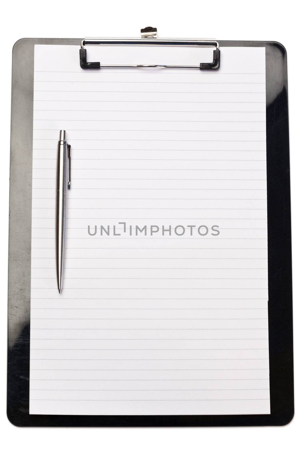 Pen on the left of note pad on a white background