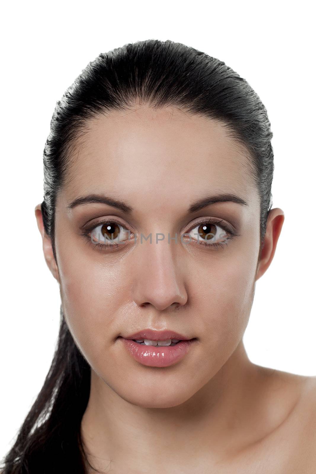 Head shot of an attractive female over a white background