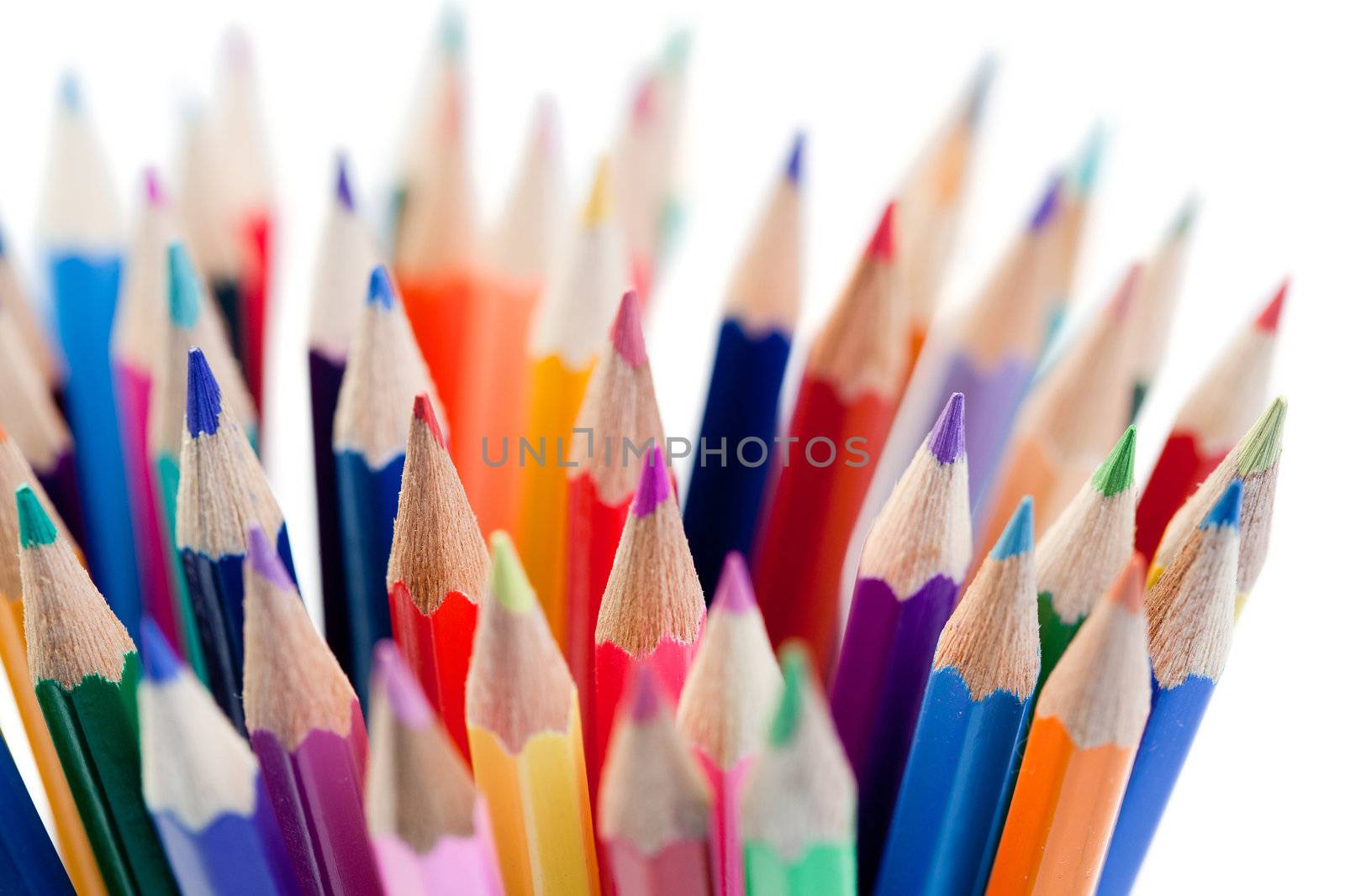 Plenty of color pencils on a white background