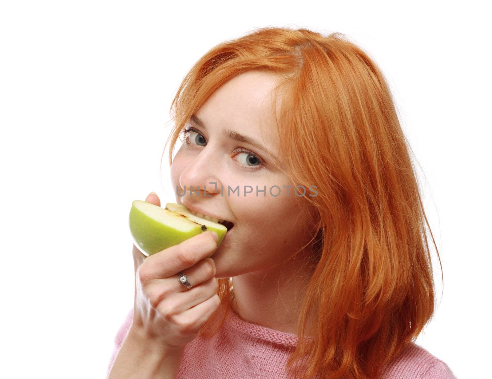 Cute girl eating an apple, white background