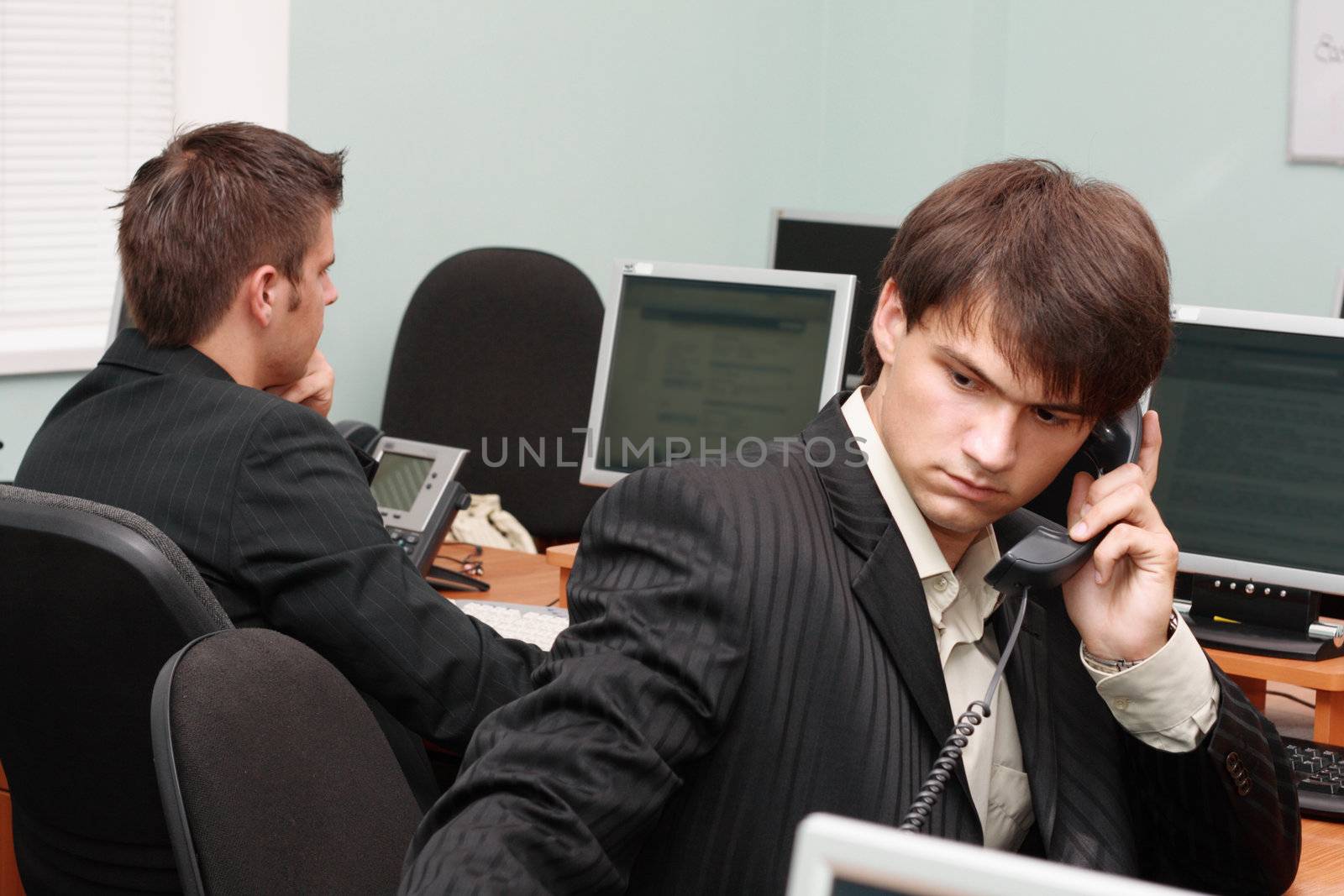 Young businessmen working in office