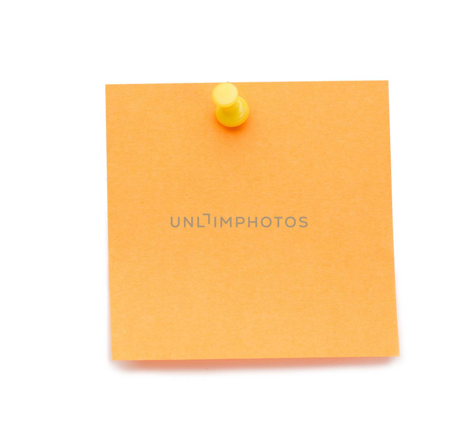 Orange post-it with drawing pin on a white background