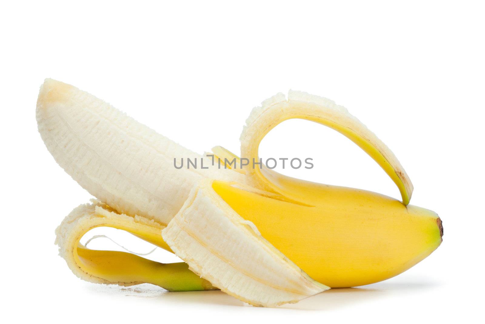 Half-peeled banana on a white background