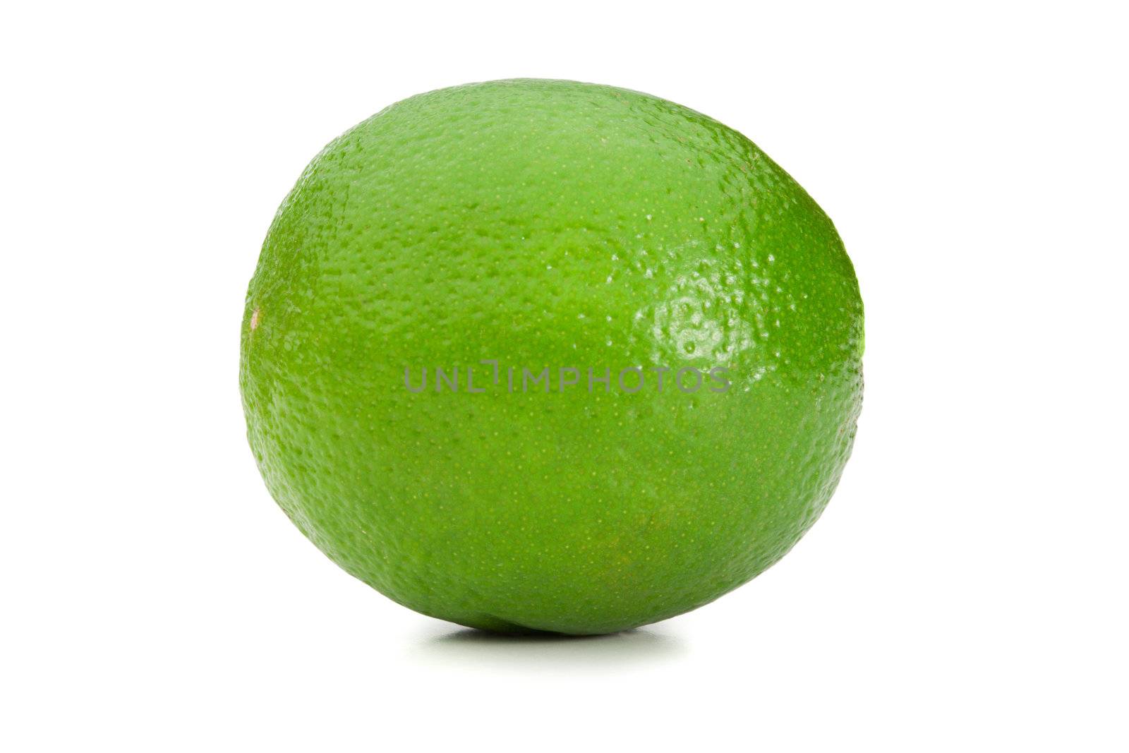 Green lemon on a white background