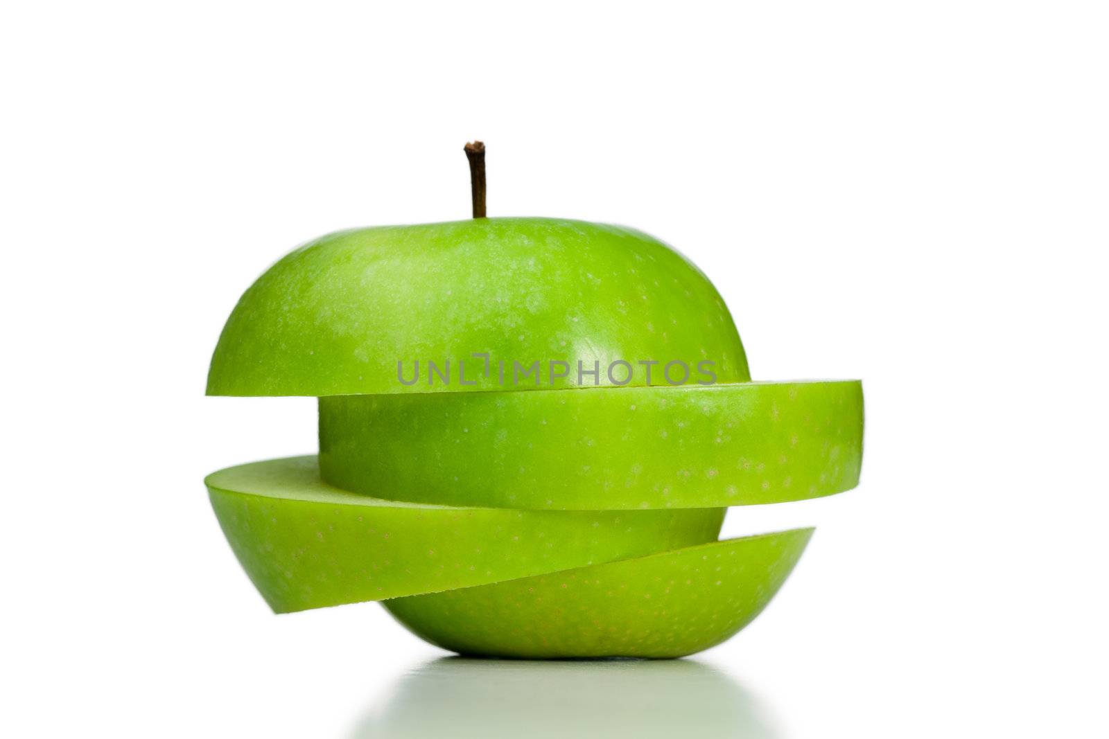 Cut and thrown of center apple on a white background