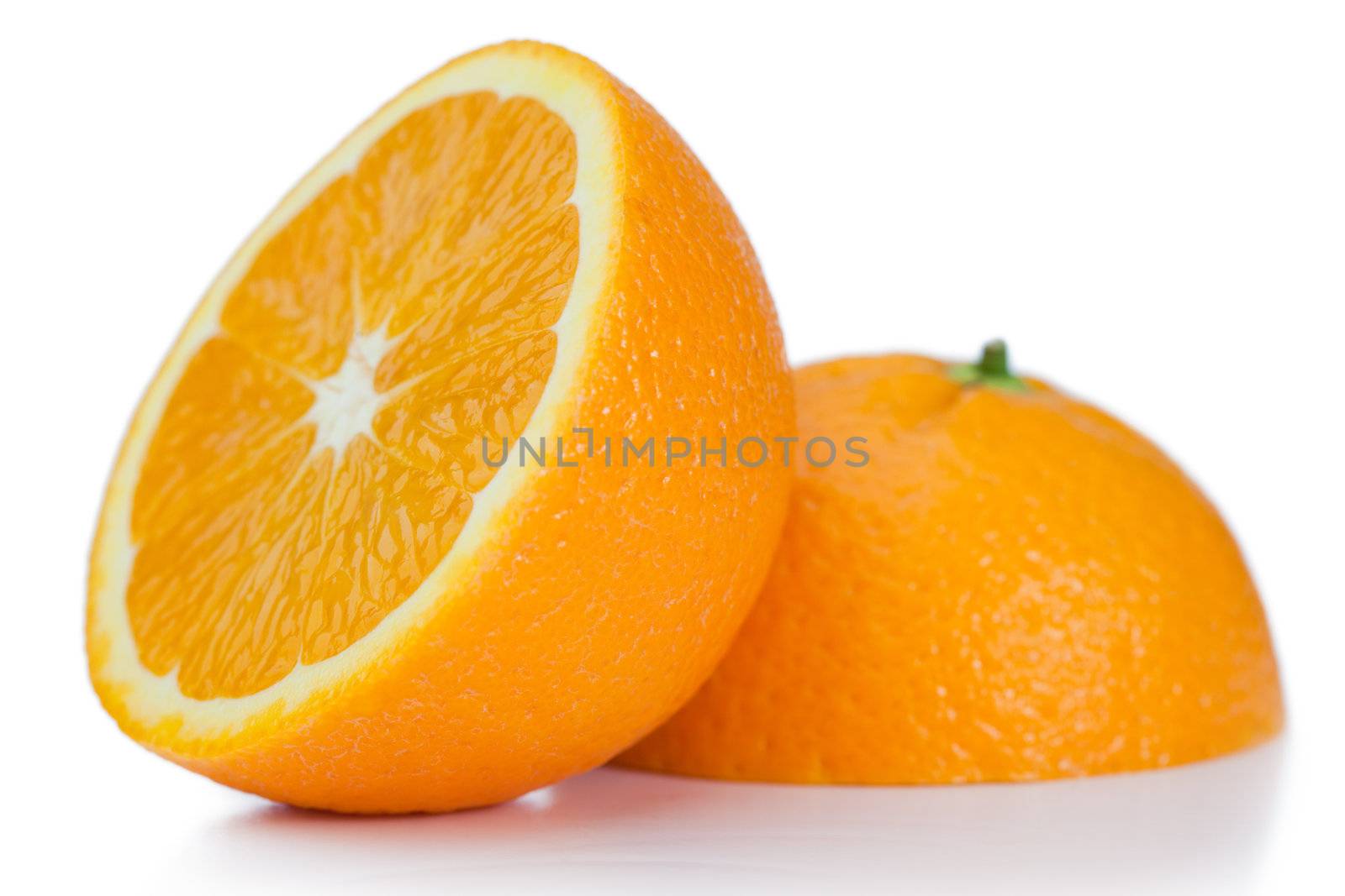 Halved orange on a white background