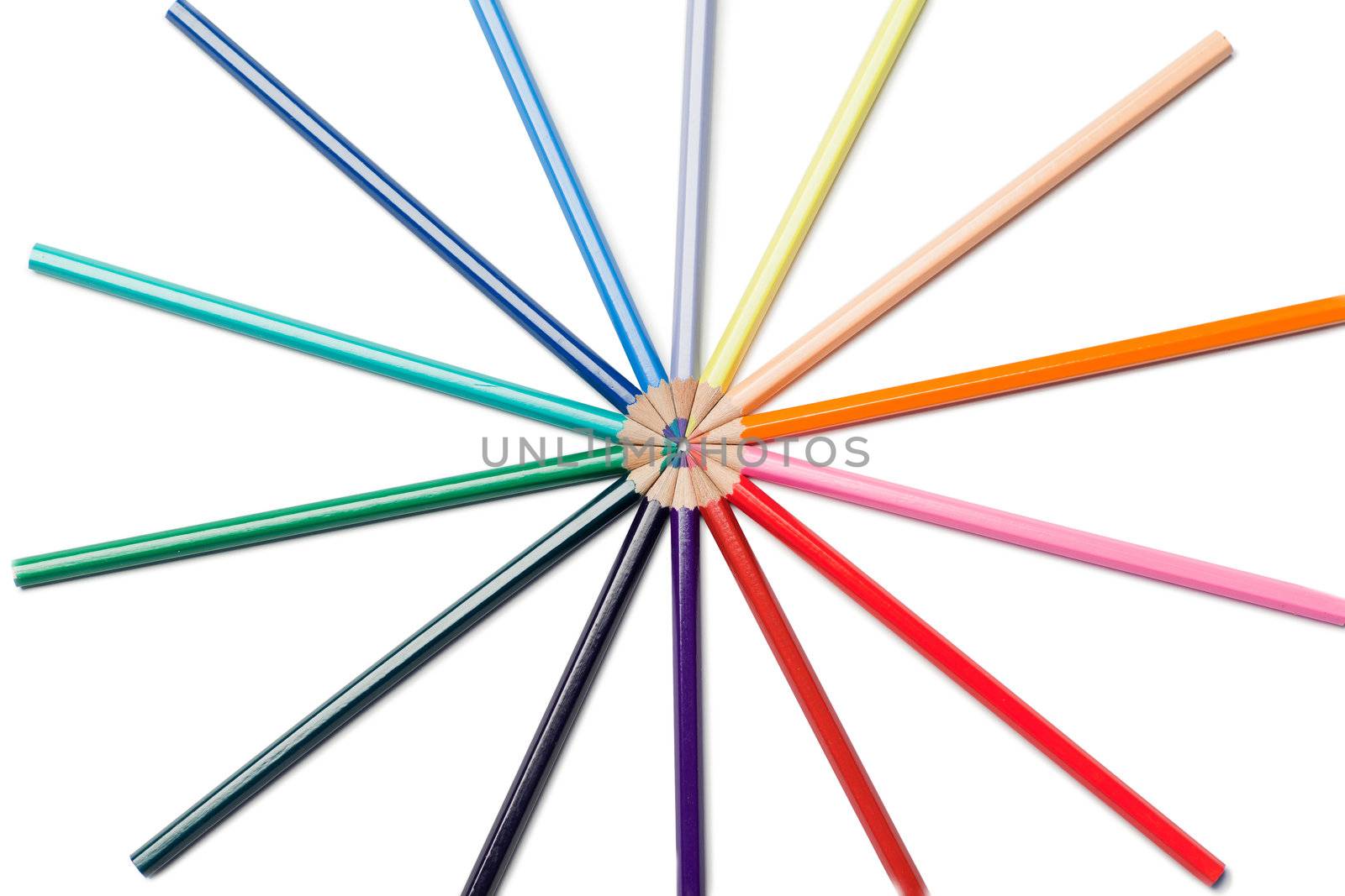 Color pencils in star on a white background