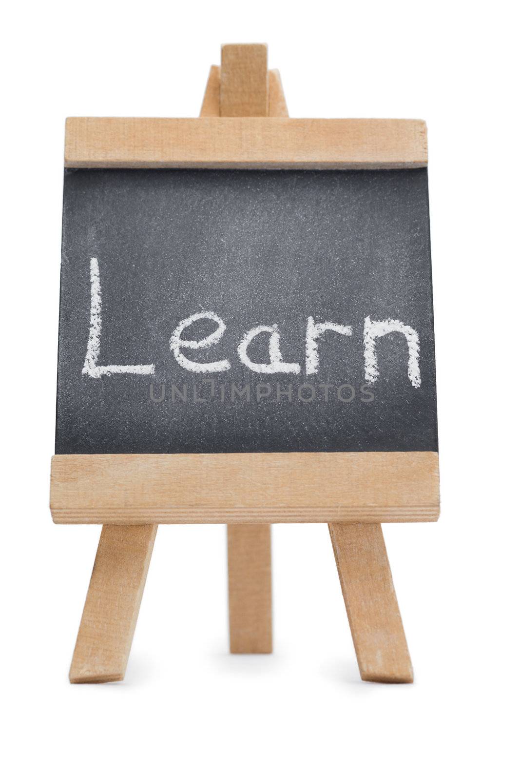 Chalkboard with the word learn written on it isolated against a white background