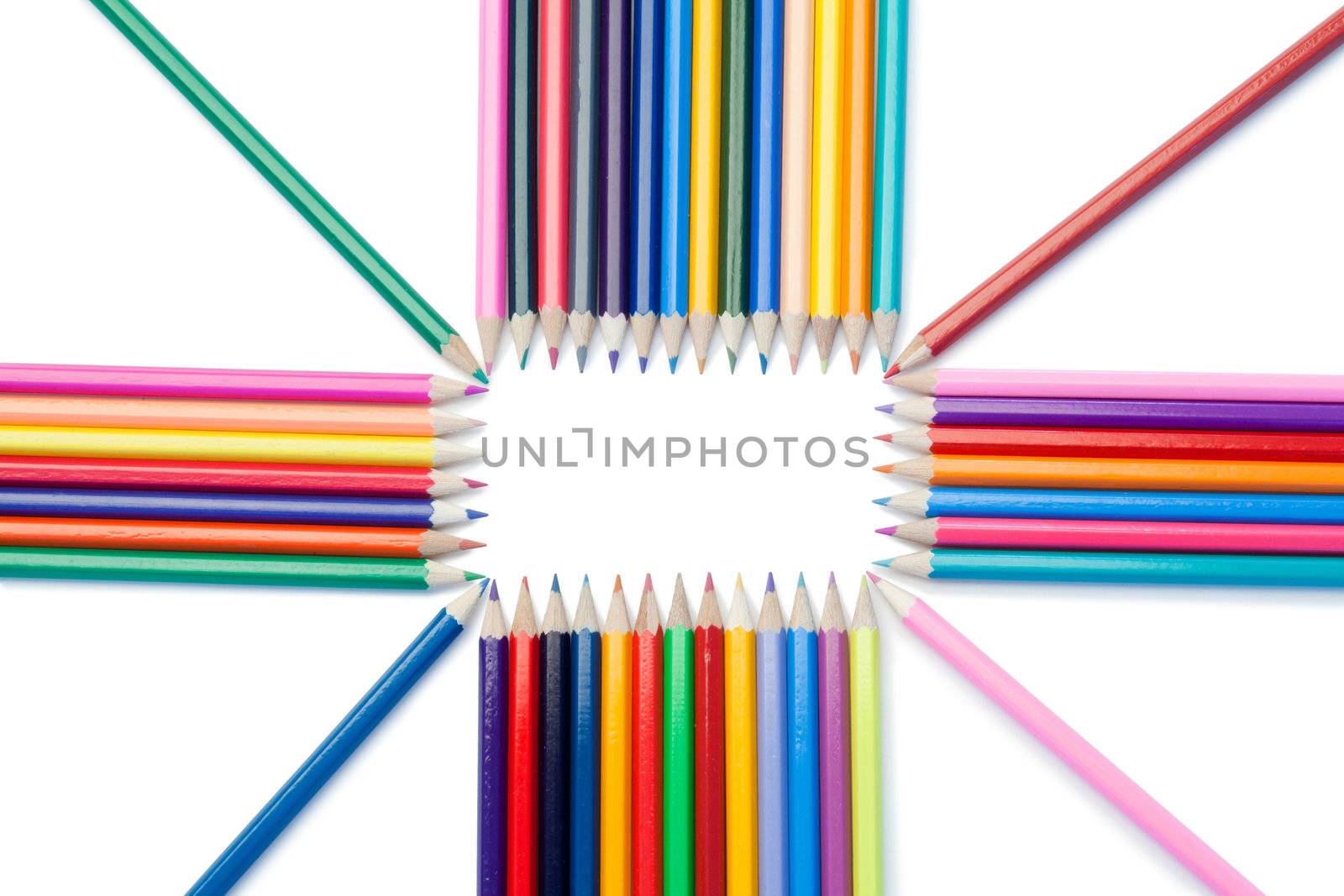 Top view of color pencils shape on a white background