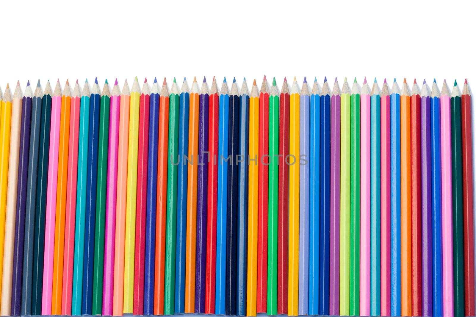 Color pencils vertical alignment on a white background