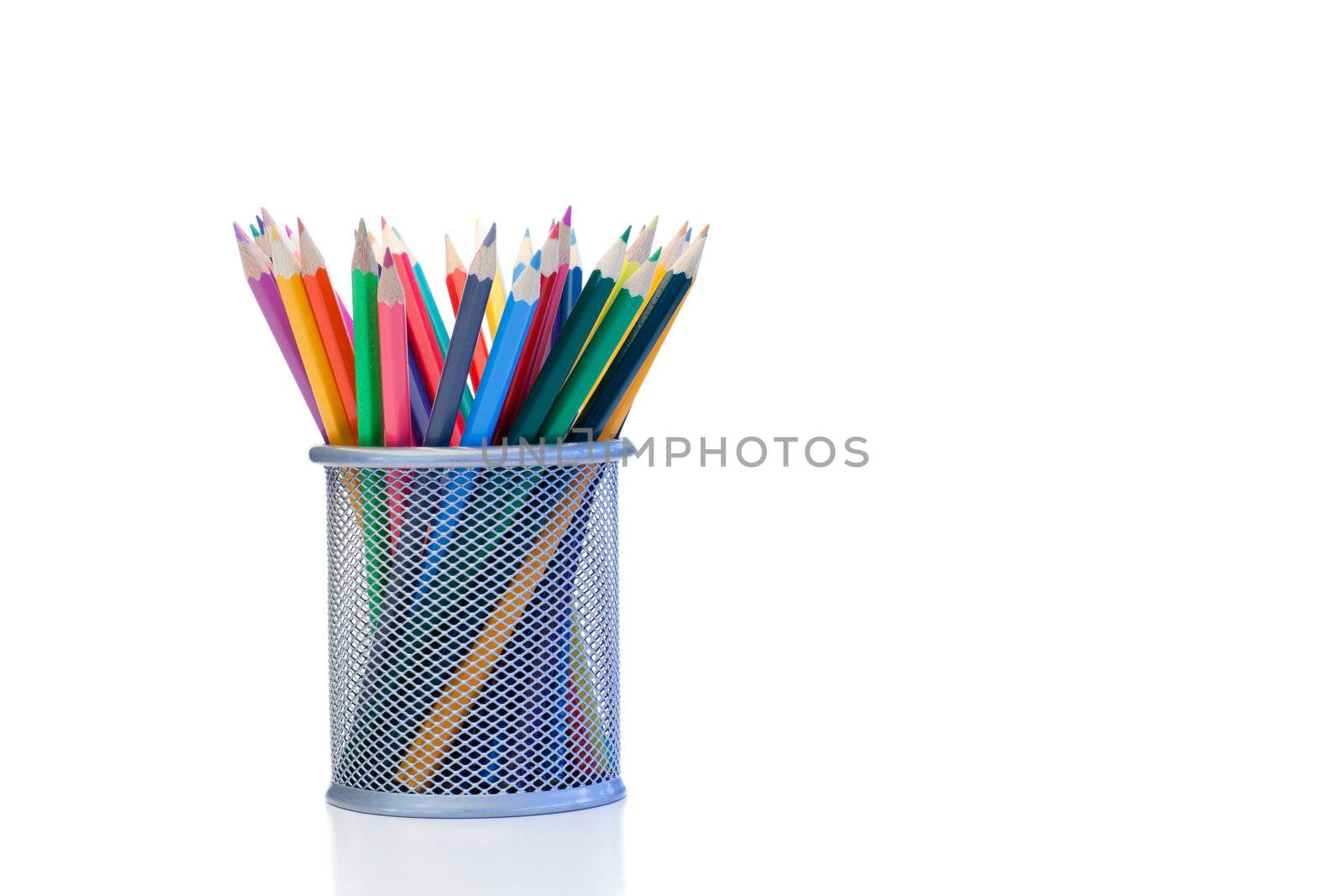 Color pencils in a jar on a white background