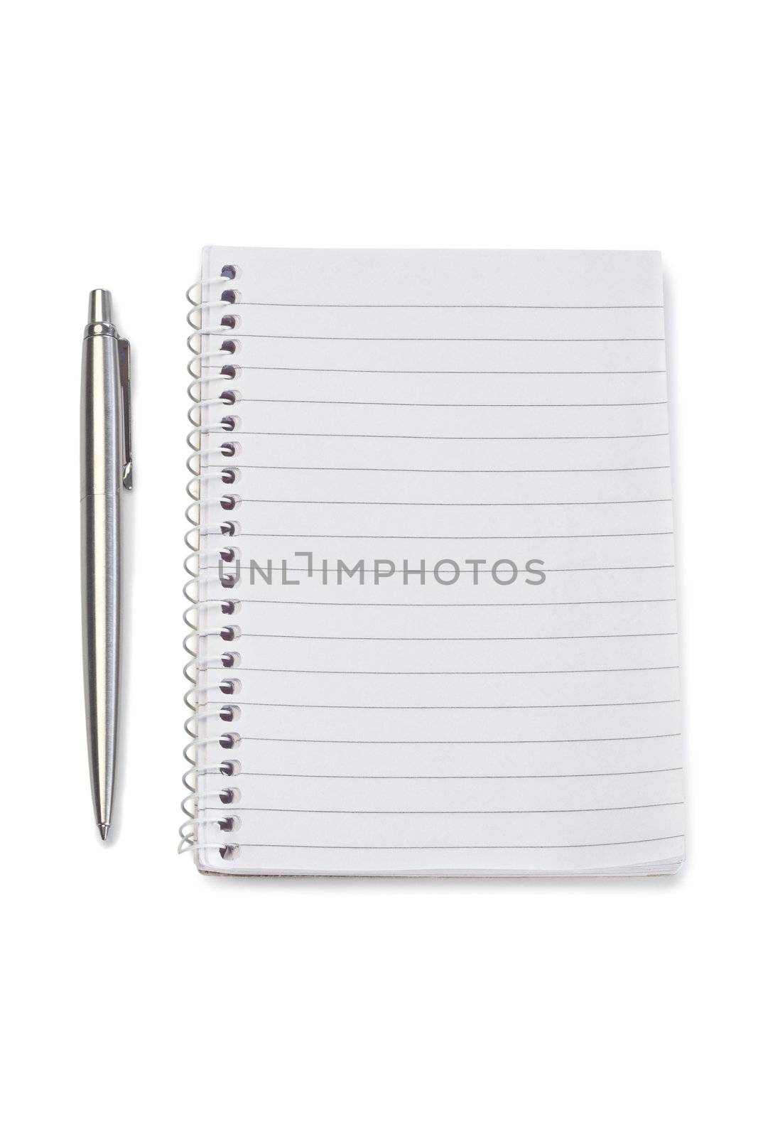 Notebook and silver pen on a white background