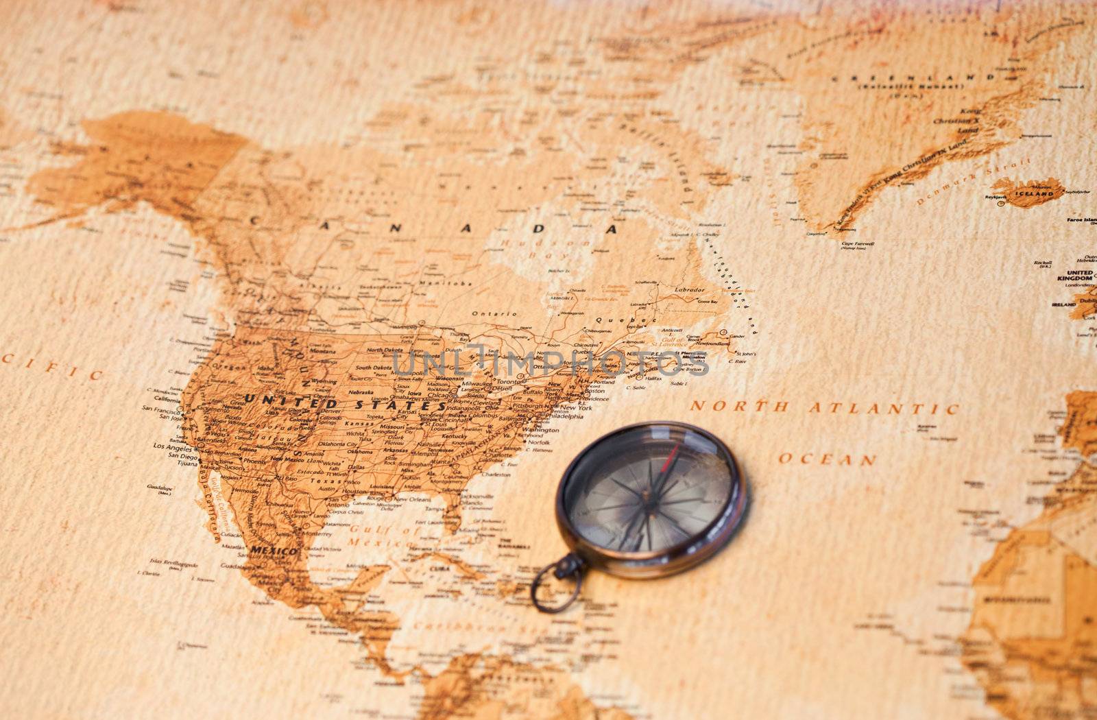 World map with compass showing North America