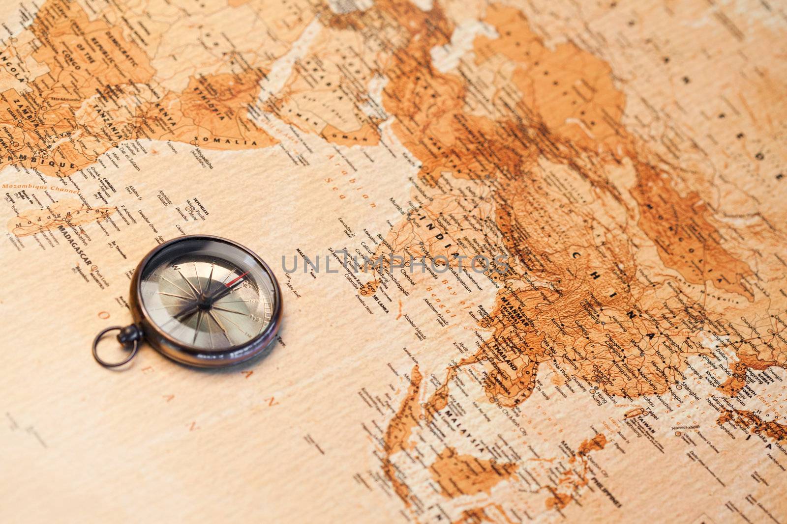 World map with compass showing Africa and Asia