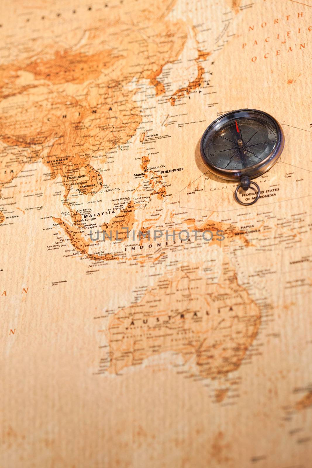 World map with compass showing Oceania