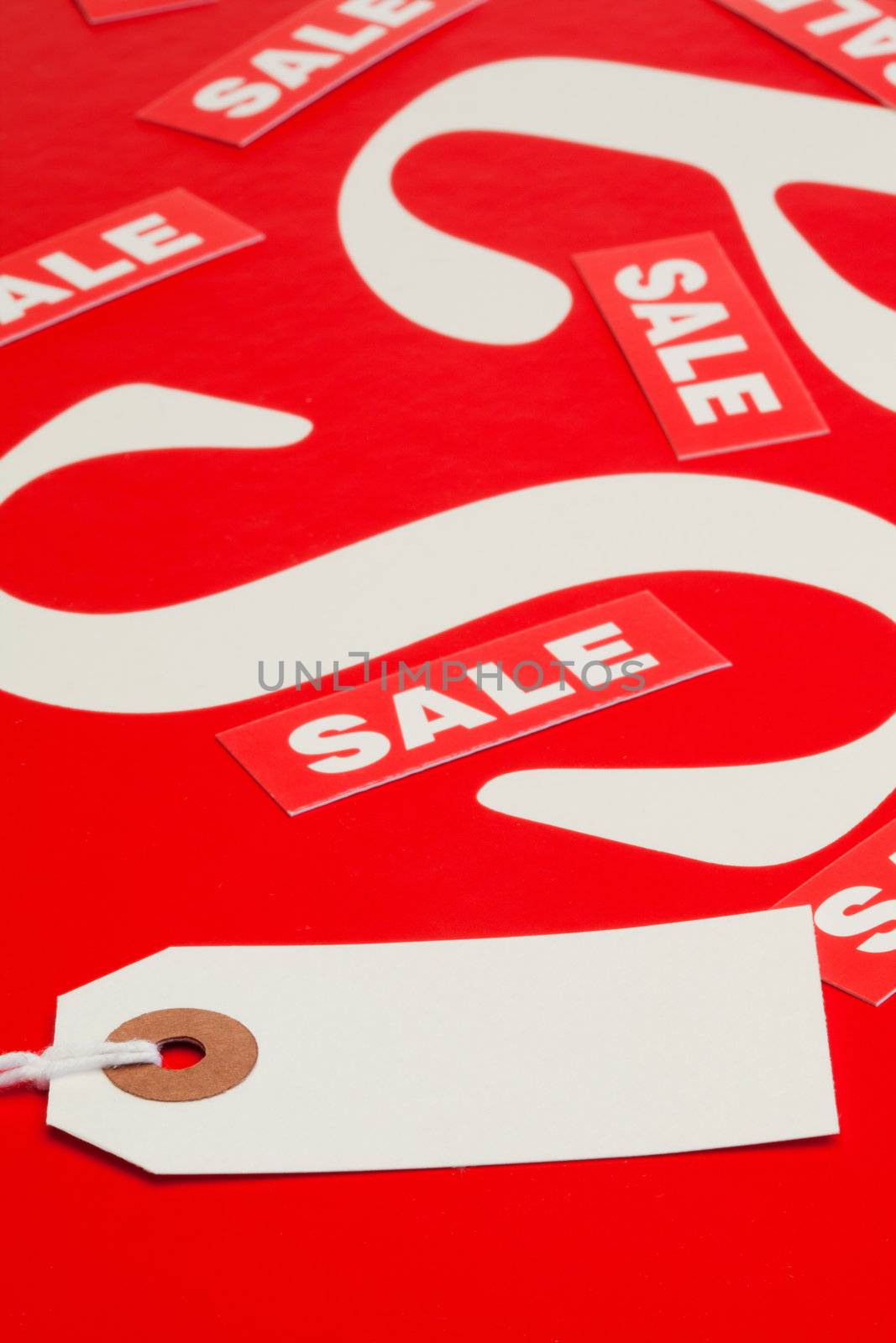 White tag on a red and white background