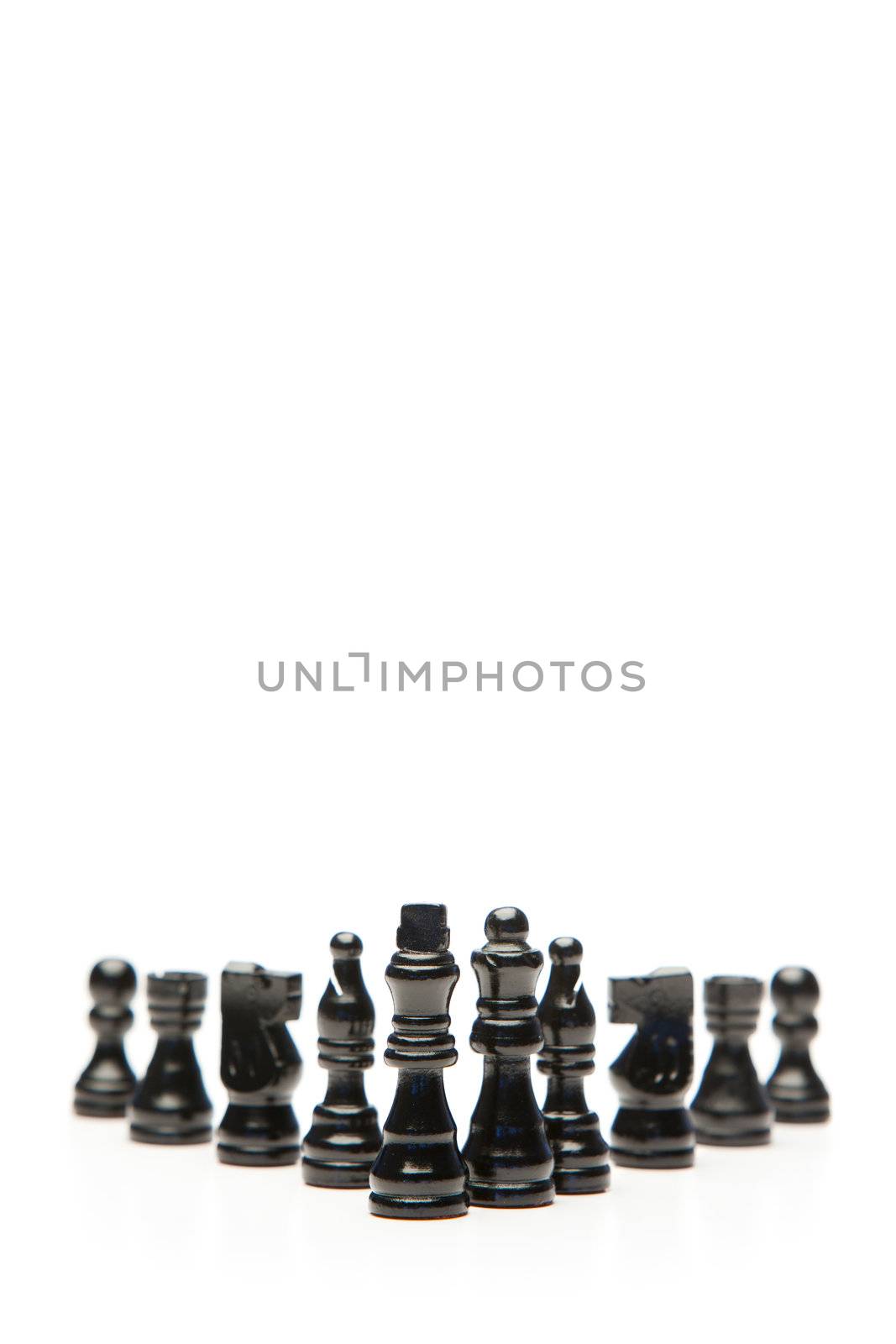 Black pieces of chess on a white background