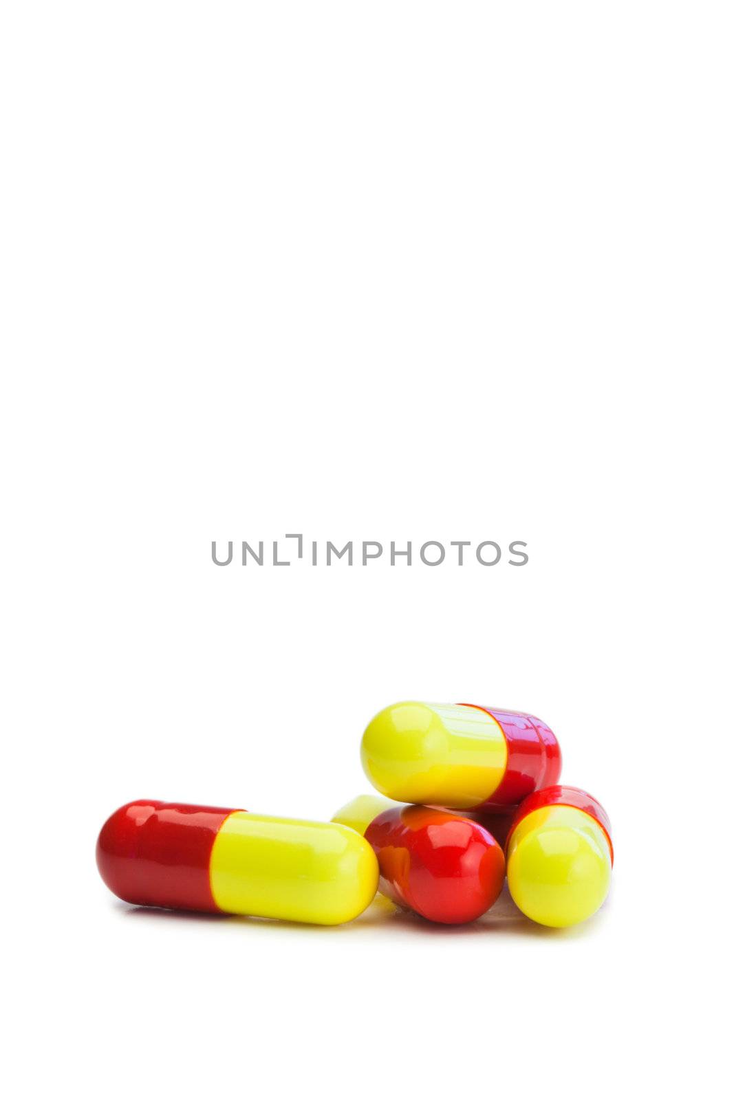 Yellow and red medicine on a white background