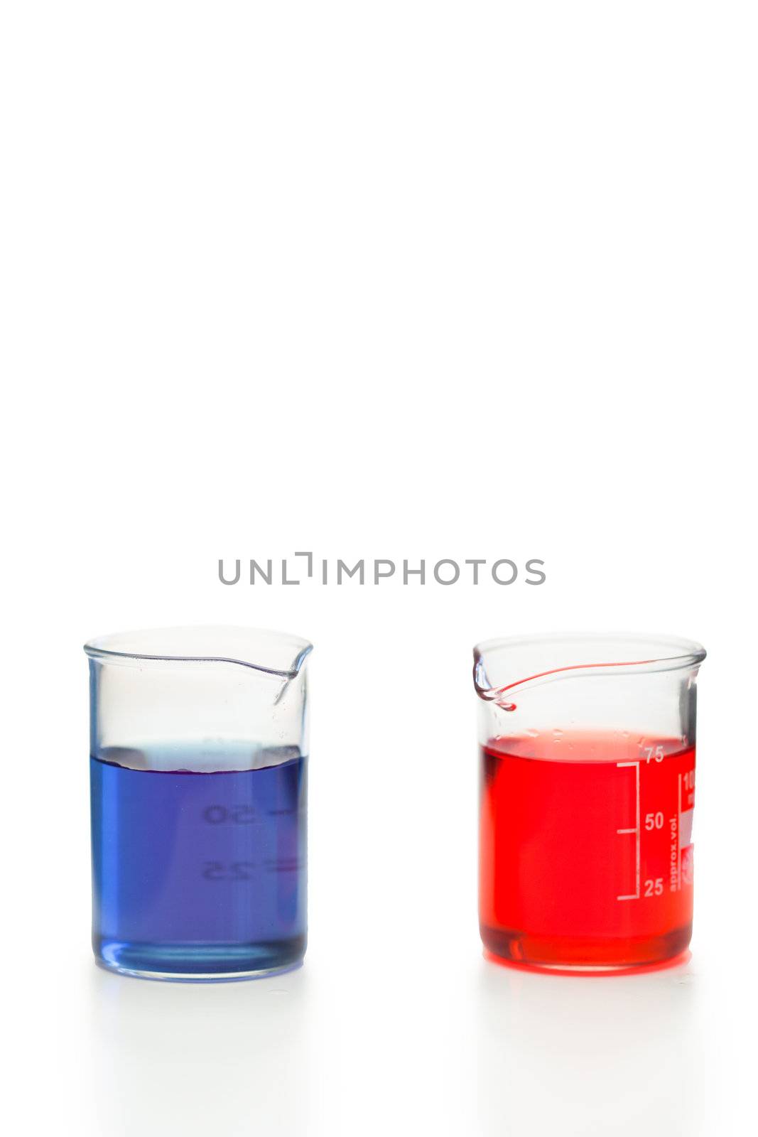 Blue and red liquid in beakers on a white background
