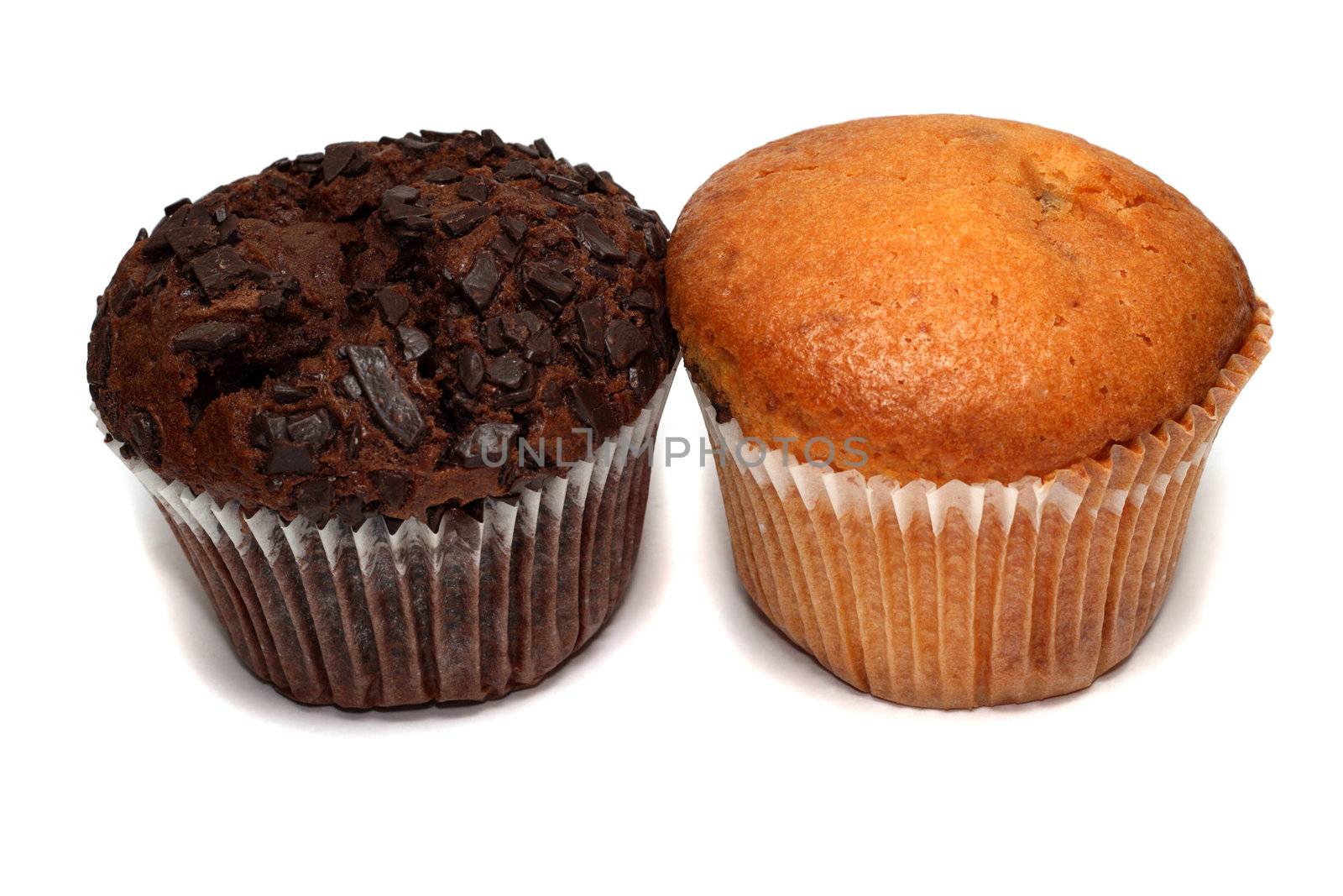 Two muffins isolated on white by Gdolgikh