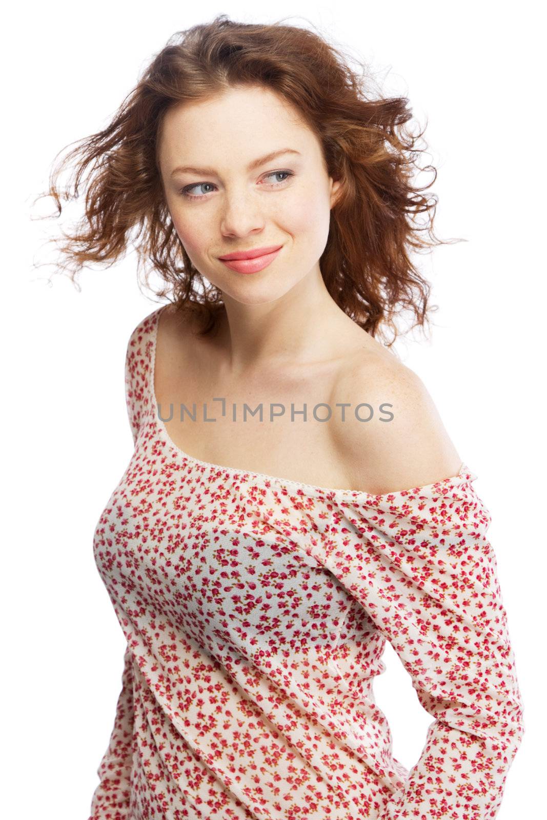 Beautiful red-haired model isolated on white background