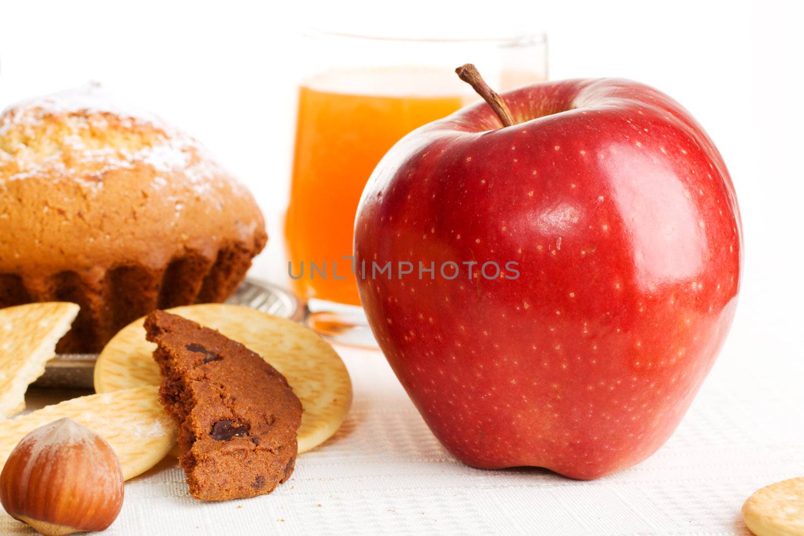 Fresh red apple and pastry