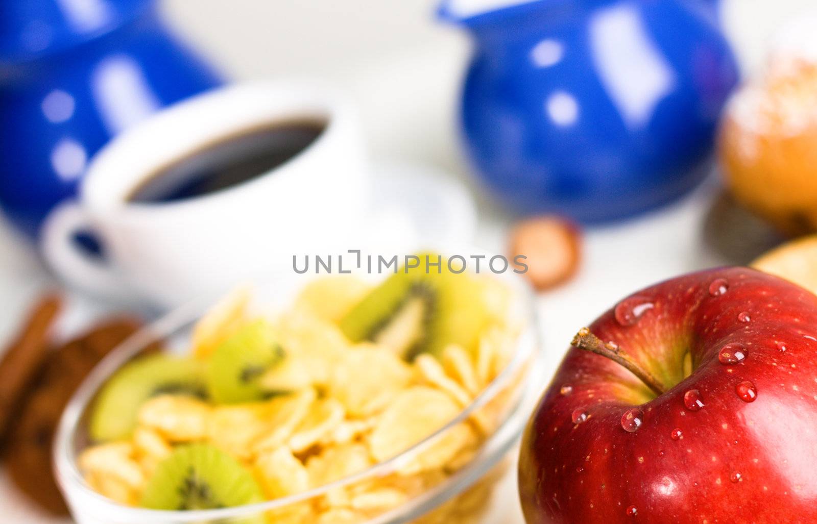 Healthy breakfast with fresh apple on foreground