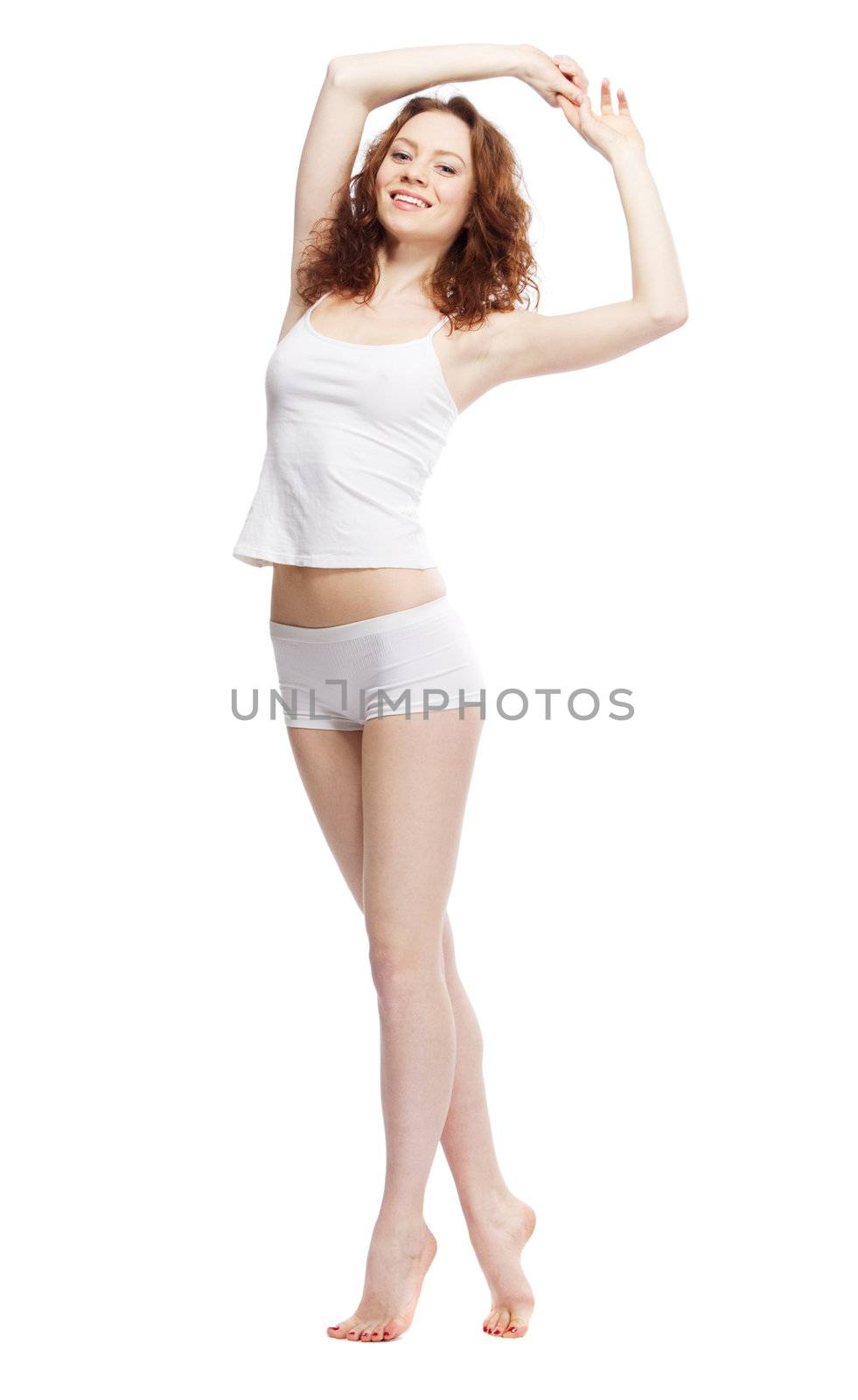 Beautiful slim woman in white clothing, isolated on white background