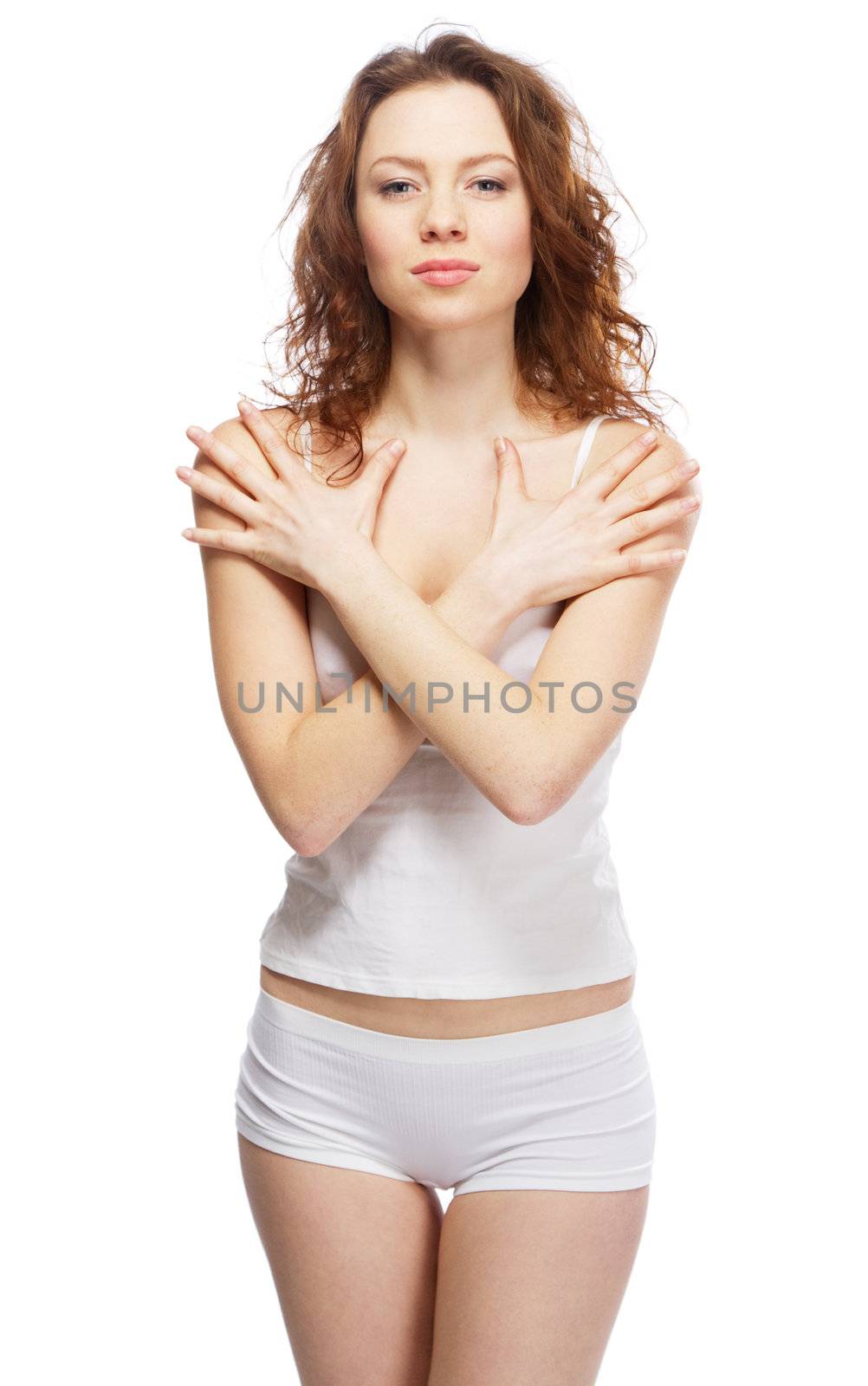Beautiful slim woman in white clothing, isolated on white background