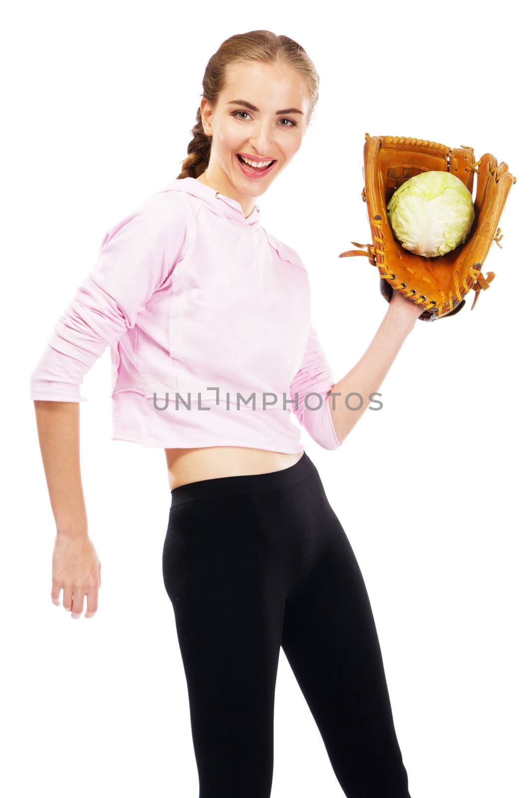 Young woman holding a cabbage in baseball glove