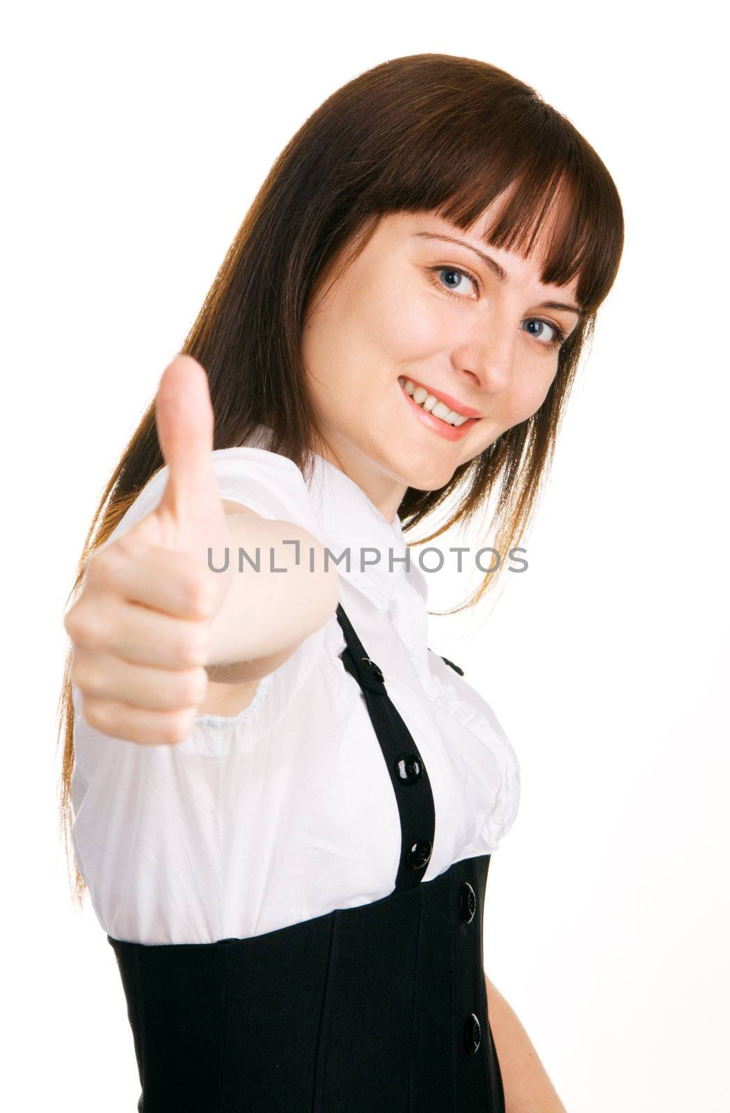 Young businesswoman showing 'thumbs up' sign