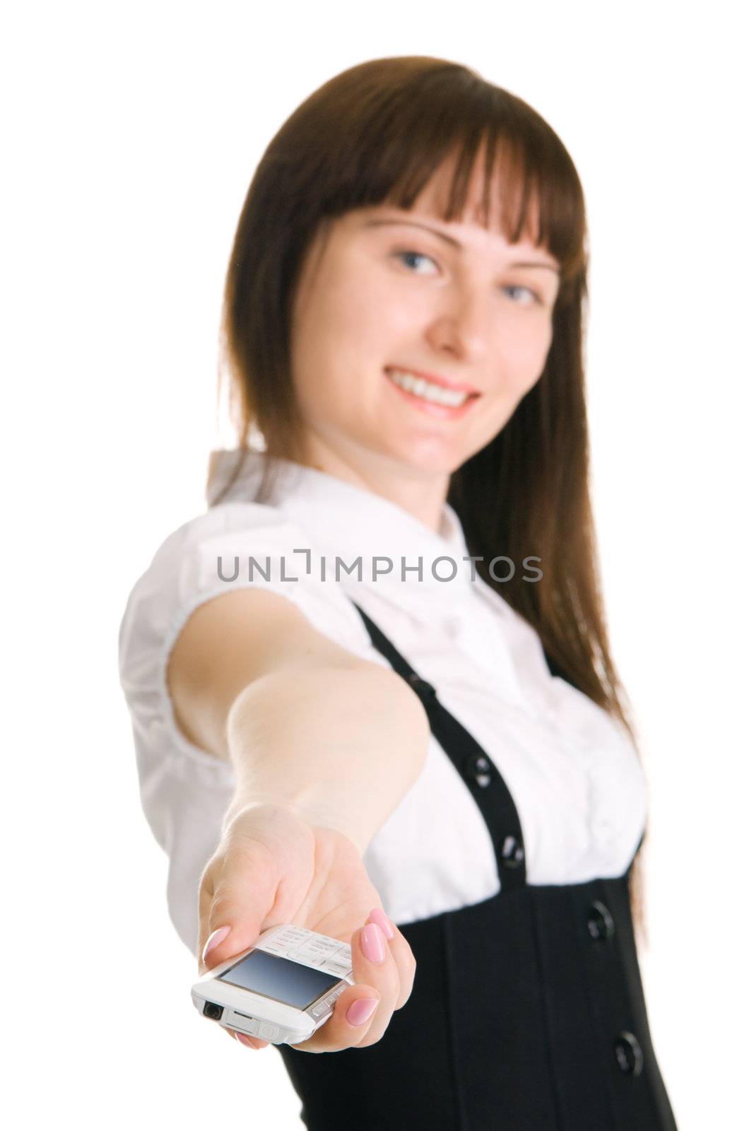Young businesswoman holding out a mobile phone, isolated on white background