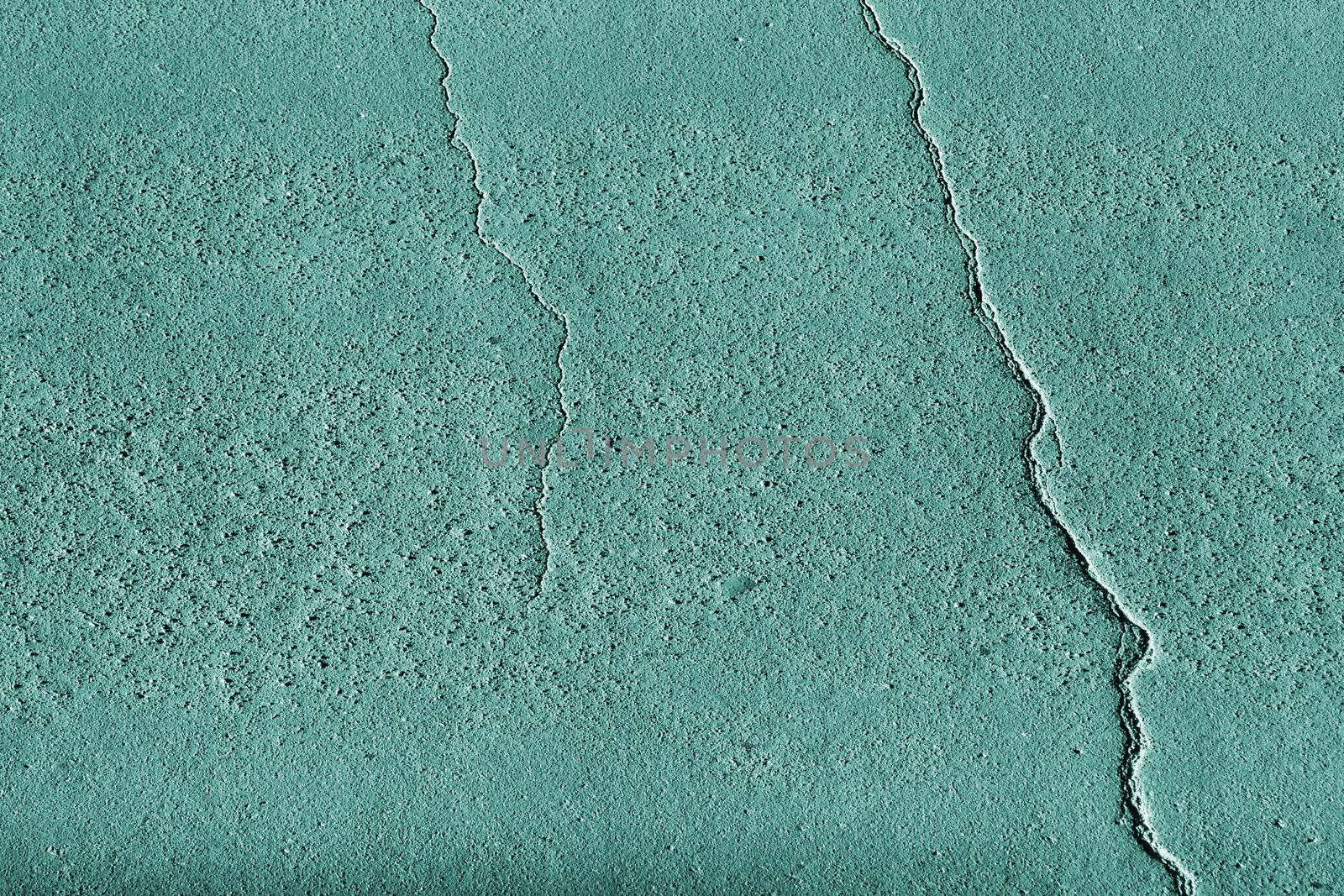 Abstract turquoise tinted texture with fissures