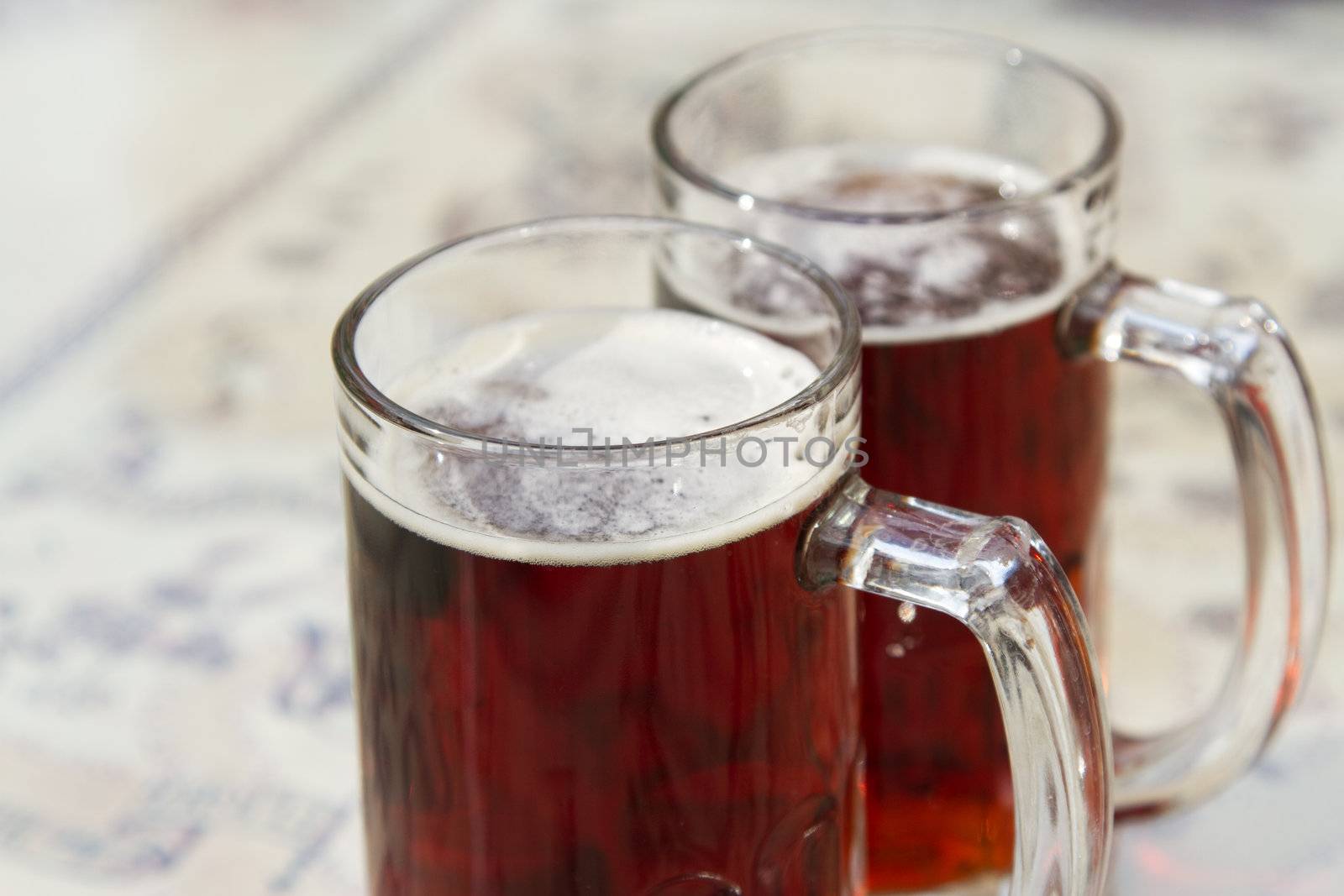 Two beer mugs closeup photo