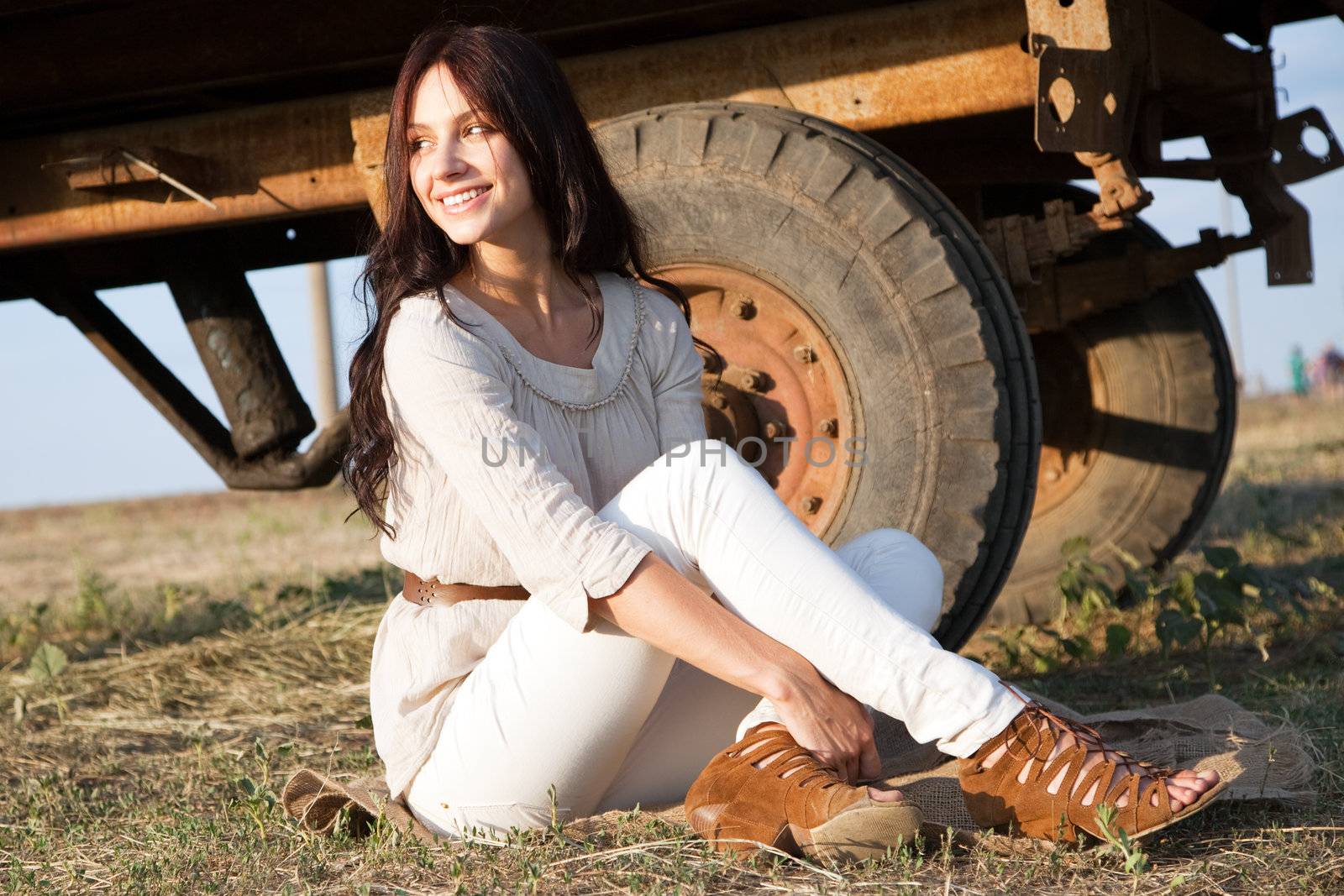 Gorgeous fashionable woman in countryside